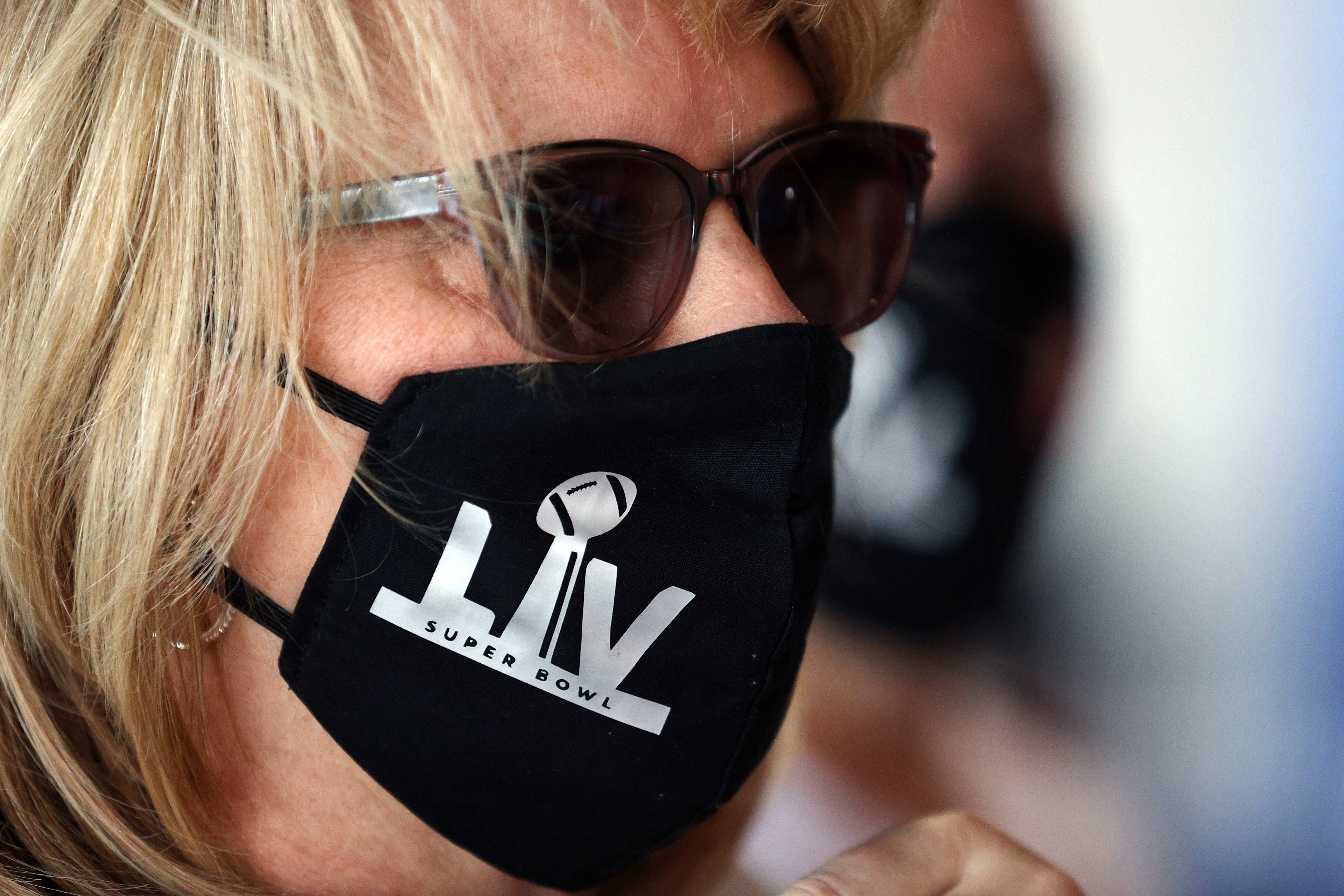 An NFL fan wore a mask while attending Super Bowl LV.