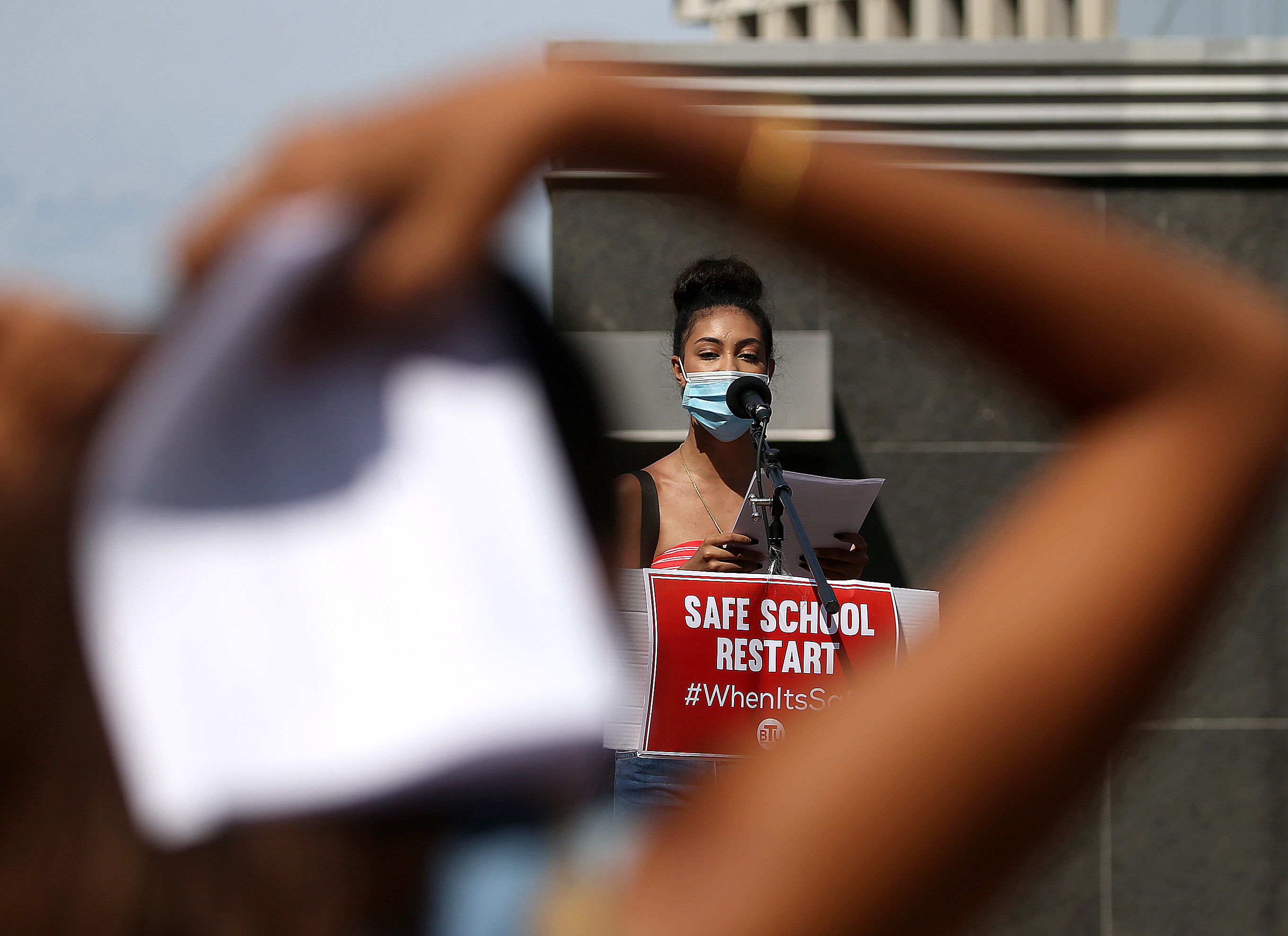Noyely Martinez, who graduated this year from Fenway High, spoke at the rally.