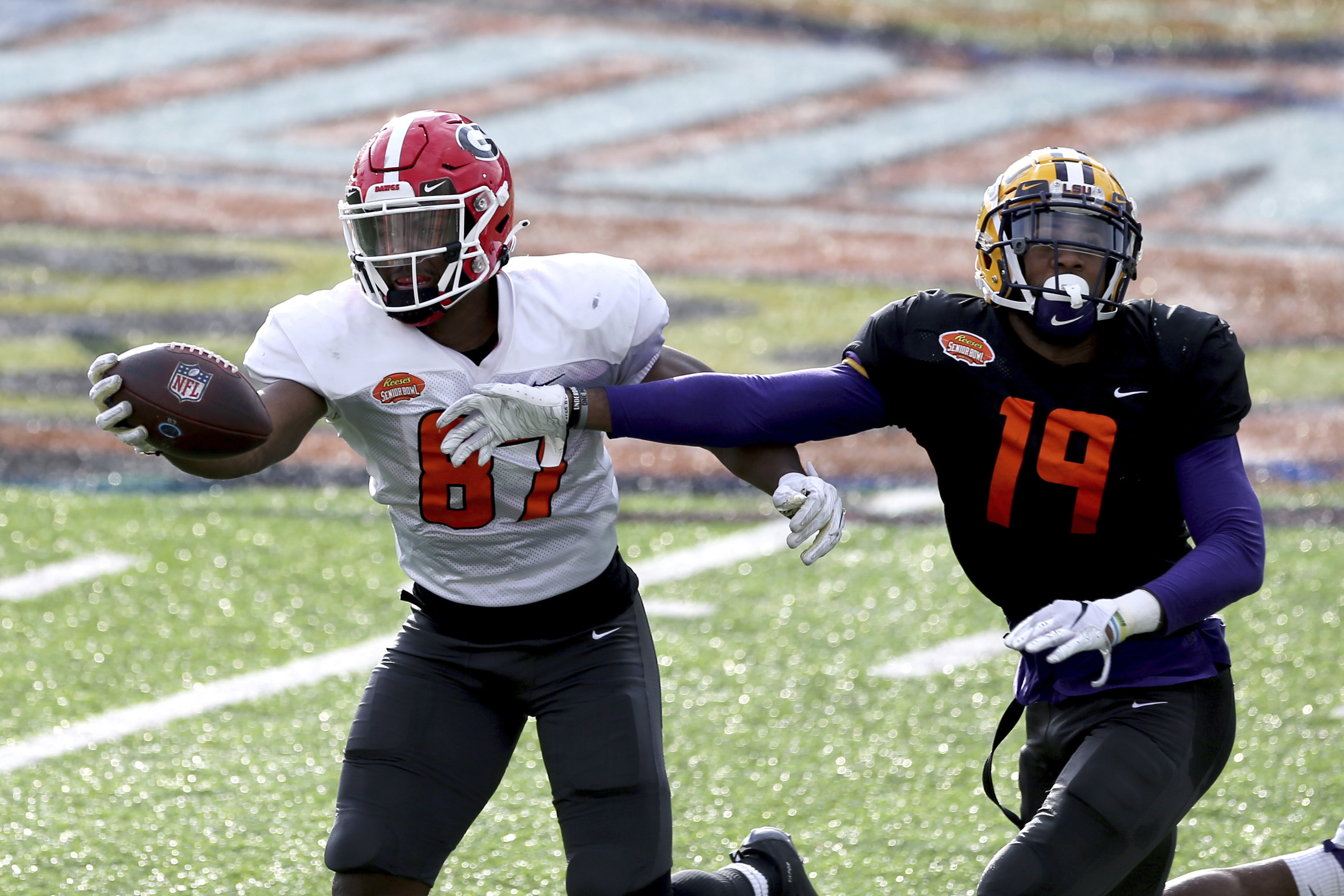 American Team tight end Tre McKitty of Georgia got past linebacker Jabril Cox of LSU to make a one-handed grab.