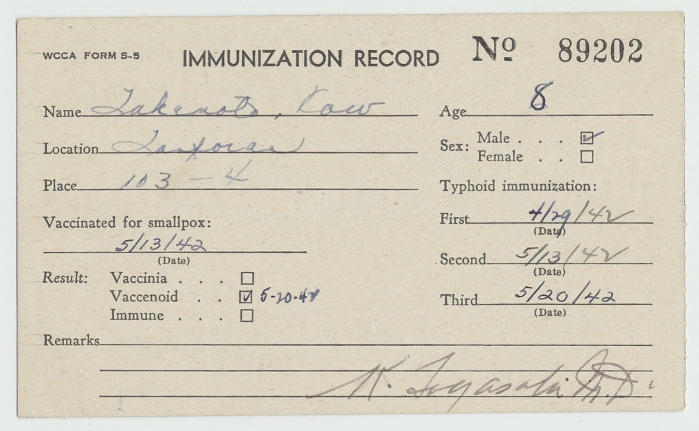 A card documenting the vaccination of an 8-year-old Japanese American boy processed at the Tanforan Racetrack in 1942.