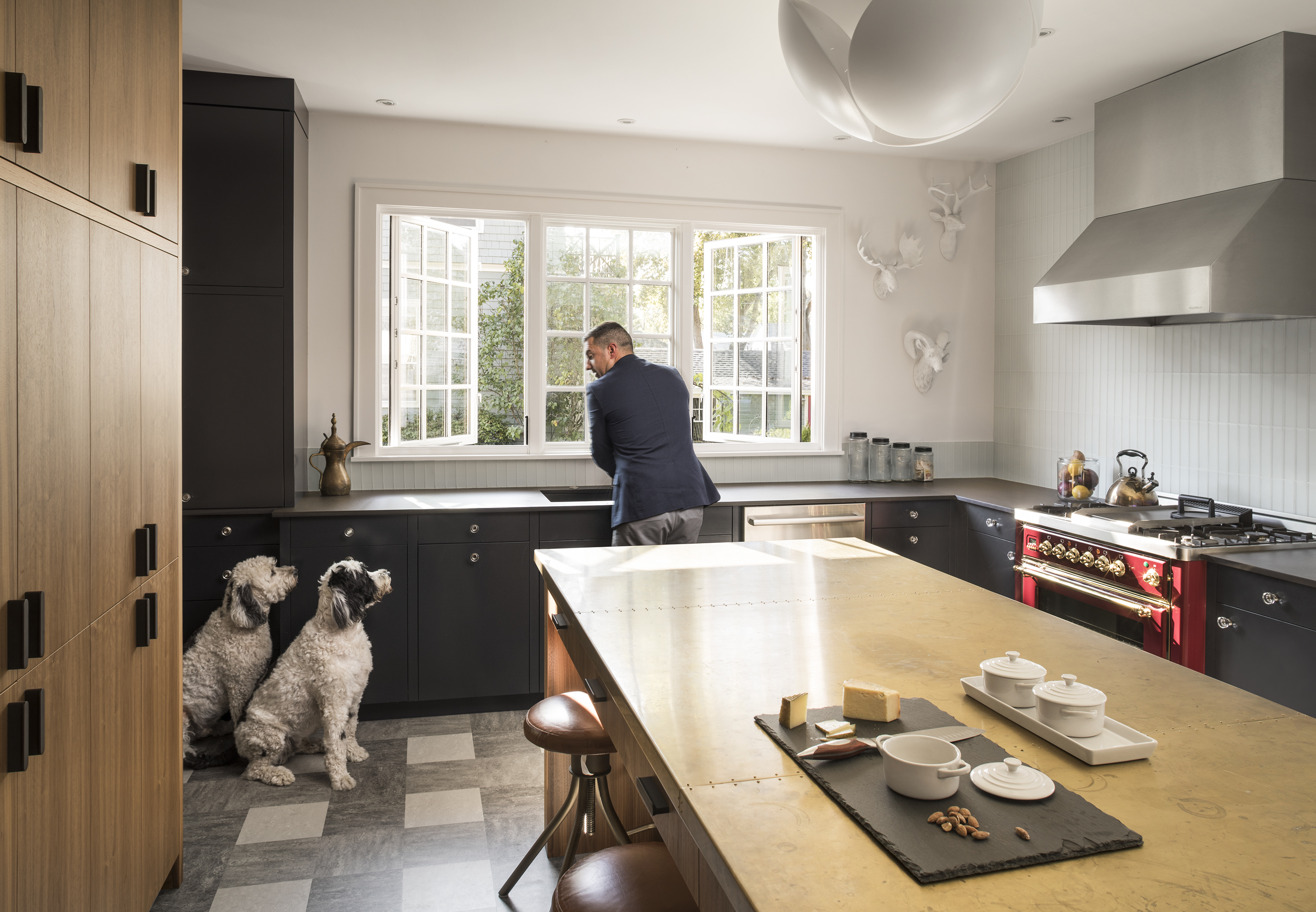 Sylvester and Melvin hope Burkhardt has treats. The couple brought the vintage Foscarini Tavolo ceiling light from D.C.