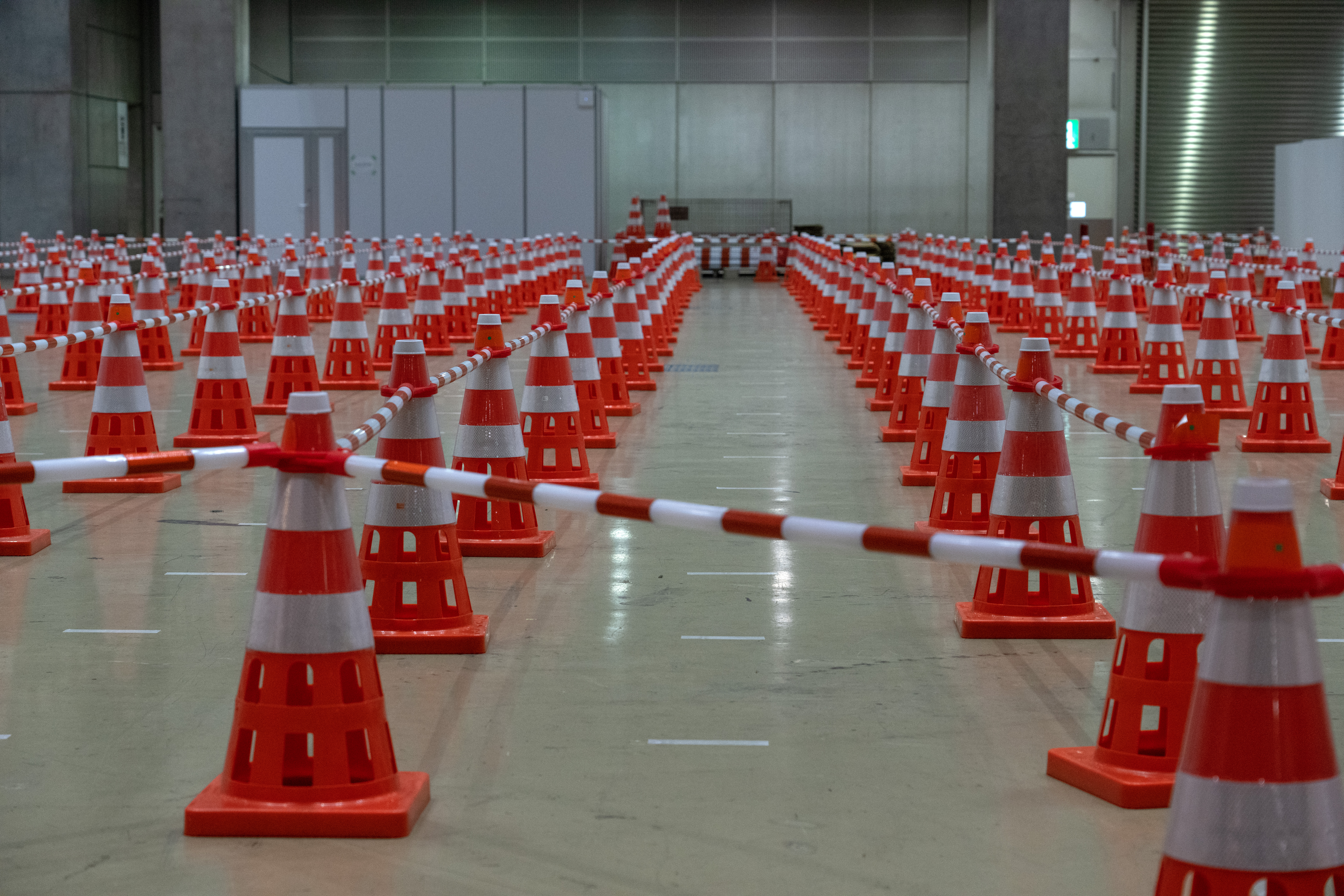 Cones mark out the queuing system at the coronavirus test collection site in the Tokyo Olympics Main Press Centre (MPC) in Tokyo.