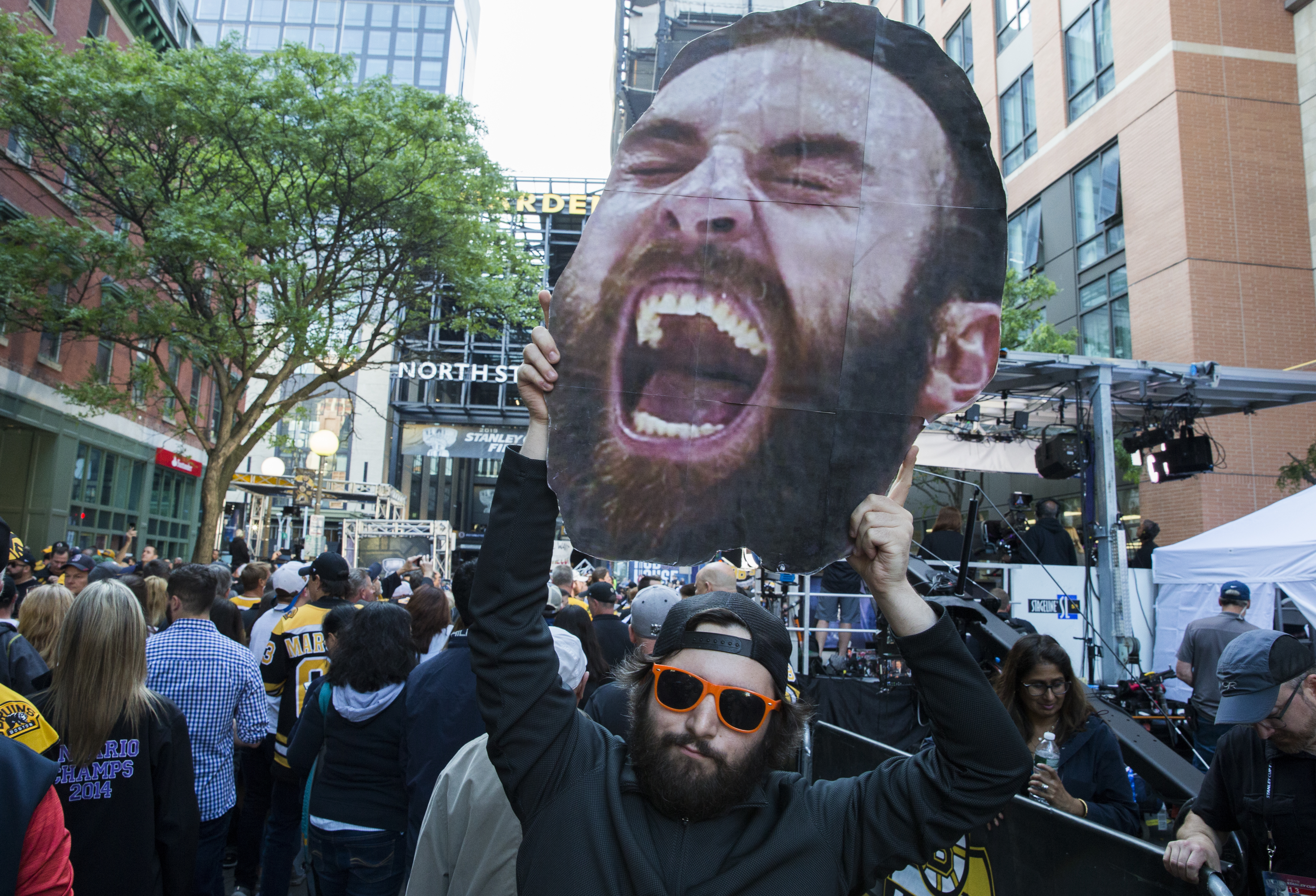 A fan held a cutout head of Zdeno Chara outside TD Garden before Game 5 of the Stanley Cup Final on June 5.