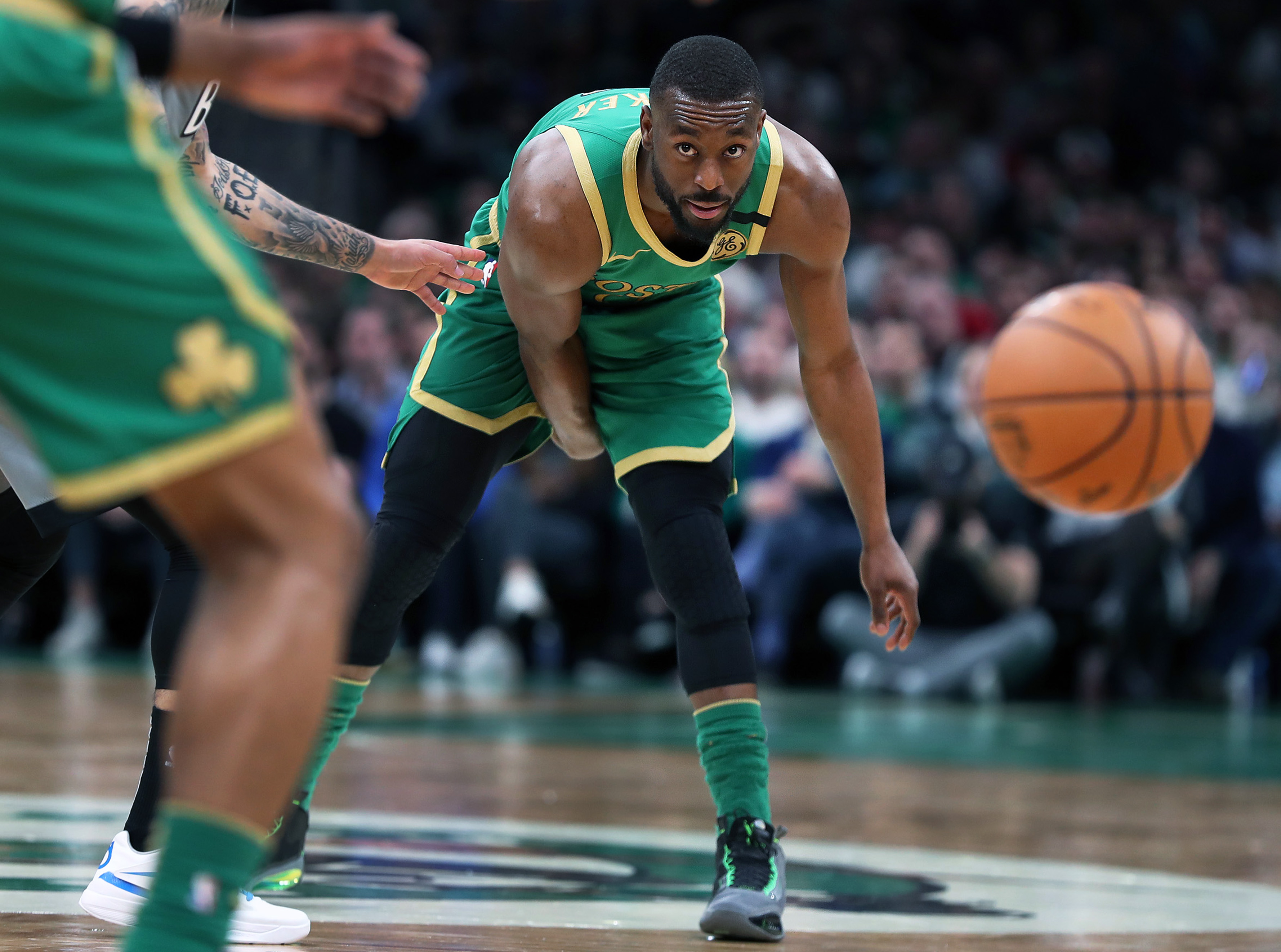 Kemba Walker delivers a bounce pass in a game last March.