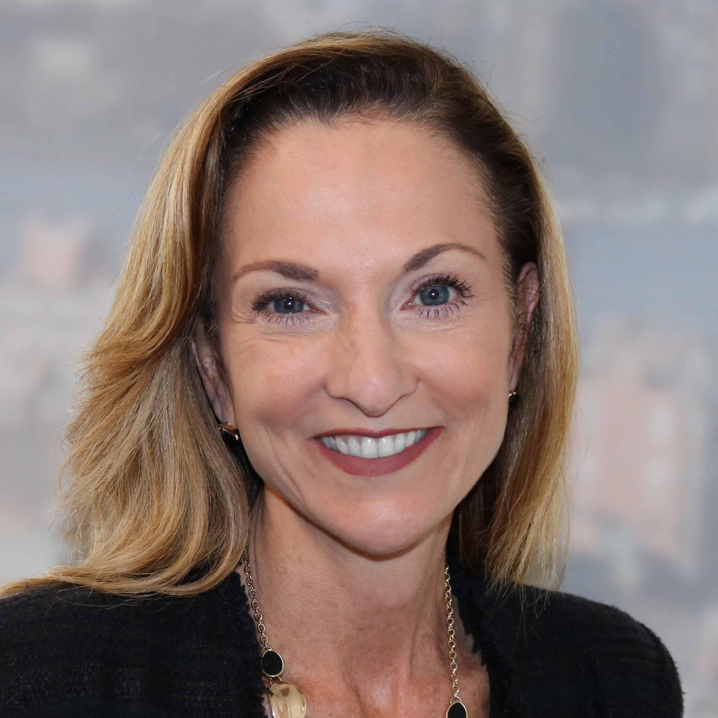 Jane Steinmetz, head of EY's Boston office, hopes to encourage clients to develop programs to on-board people with cognitive differences, like the one that EY offers.
