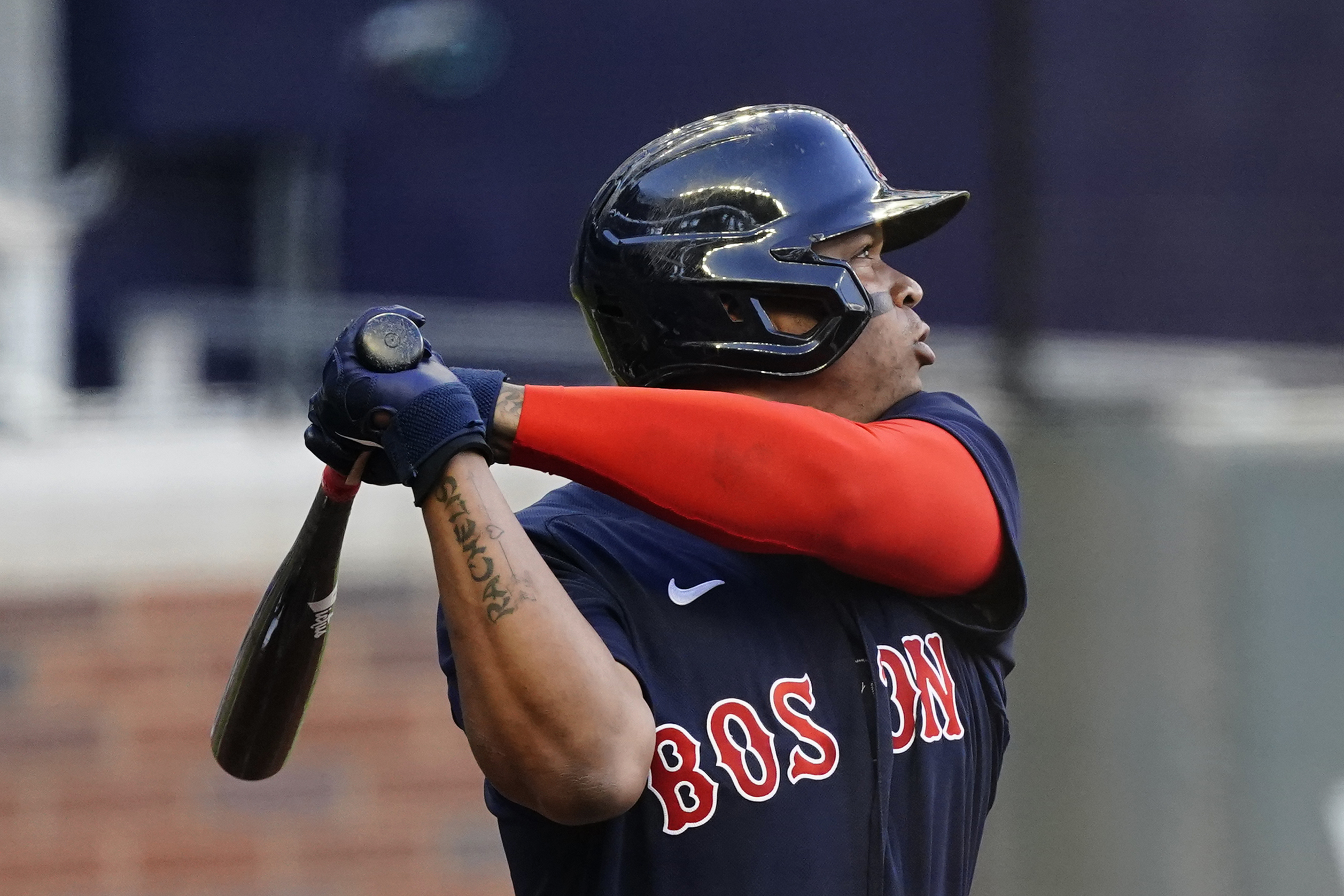 Rafael Devers watches his first-inning homer head for the seats Tuesday night.