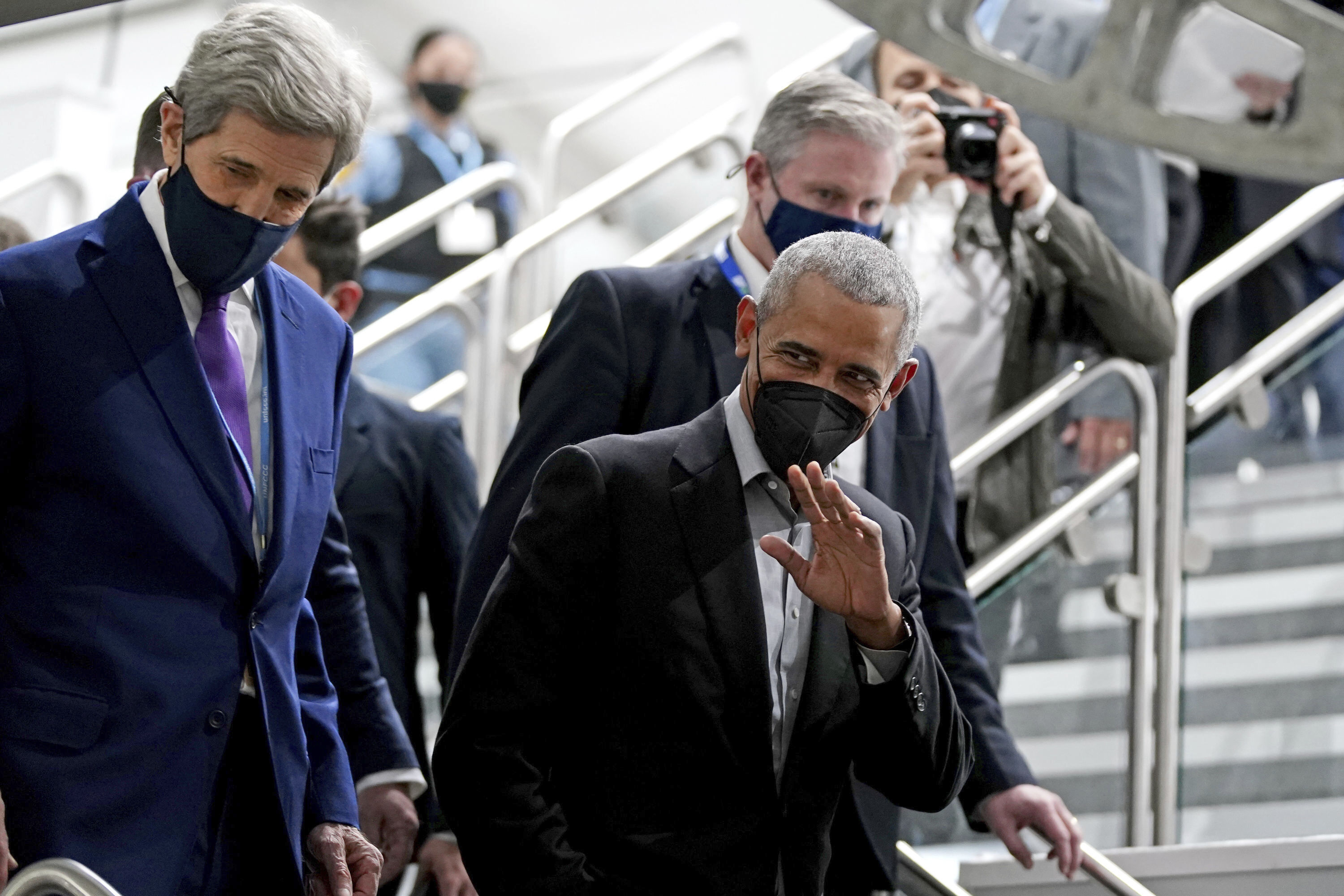 Former president Barack Obama was accompanied by Kerry as he arrived at a COP26 event.