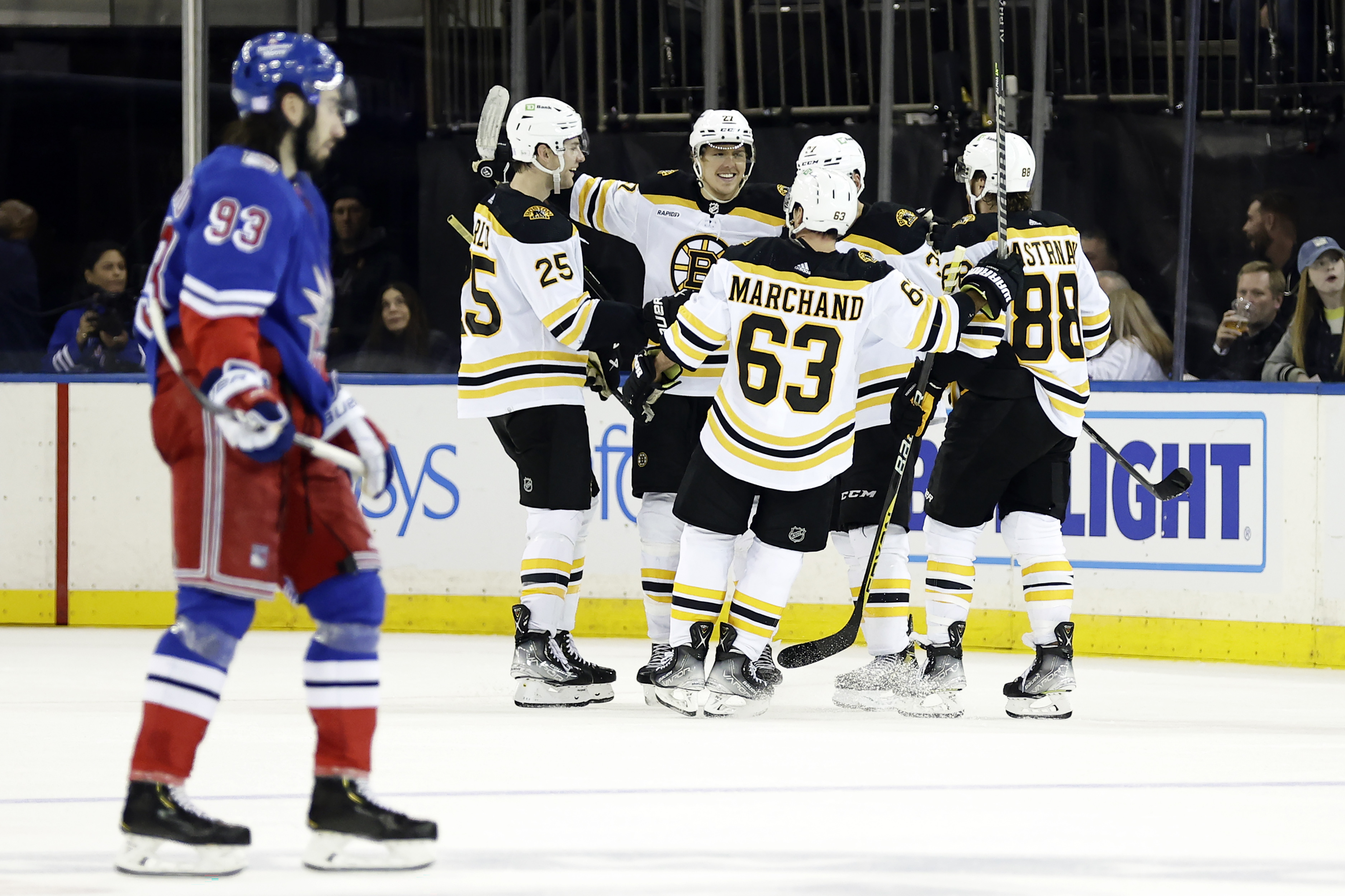 Boston Bruins center Charlie Coyle (13) celebrates after scoring a goal  against the New York Rangers during the second period of an NHL hockey  game, Sunday, Oct. 27, 2019, at Madison Square