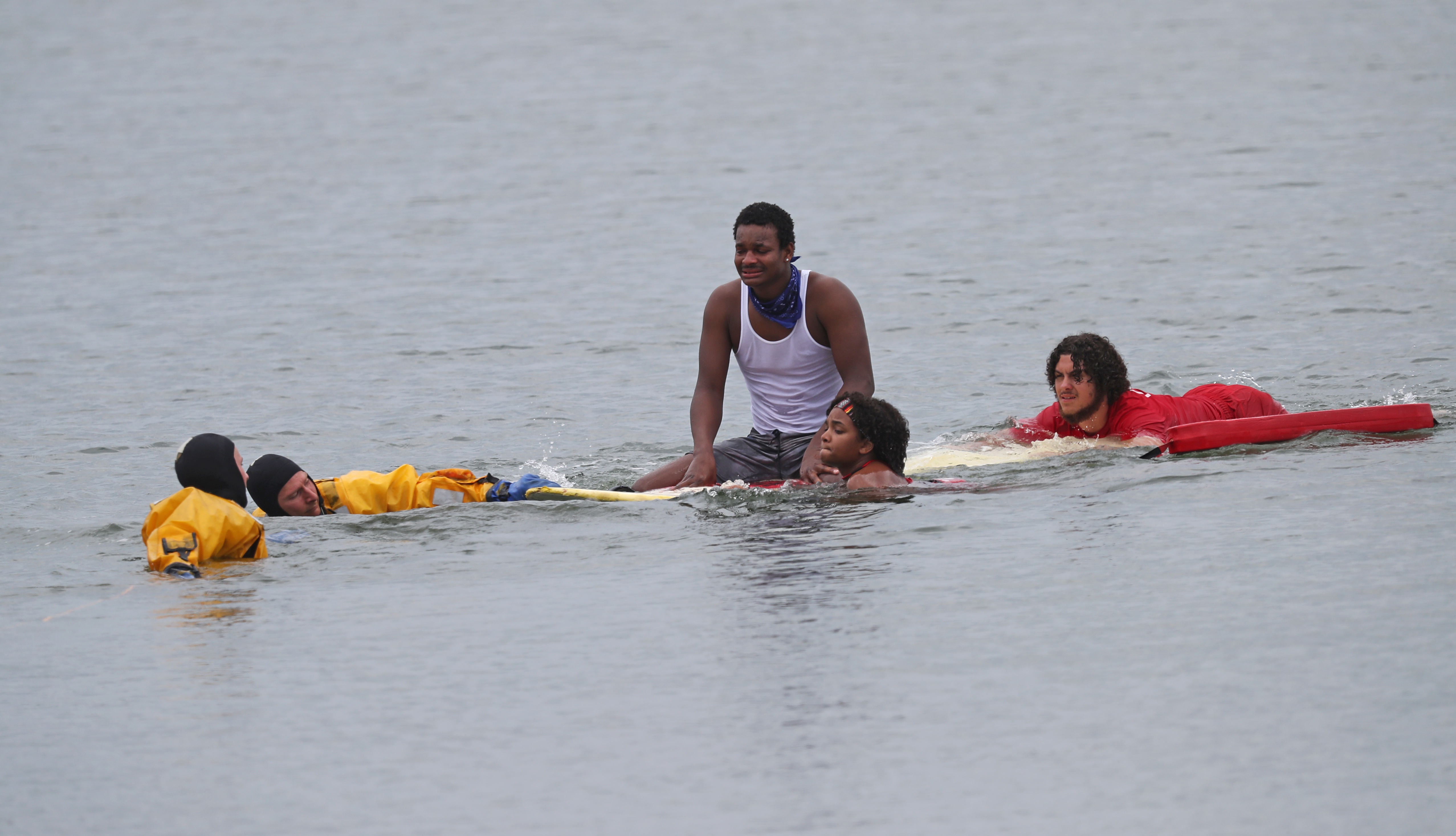 Rescuers with BFD and lifeguards rescued a swimmer in waters off Castle Island on Thursday.