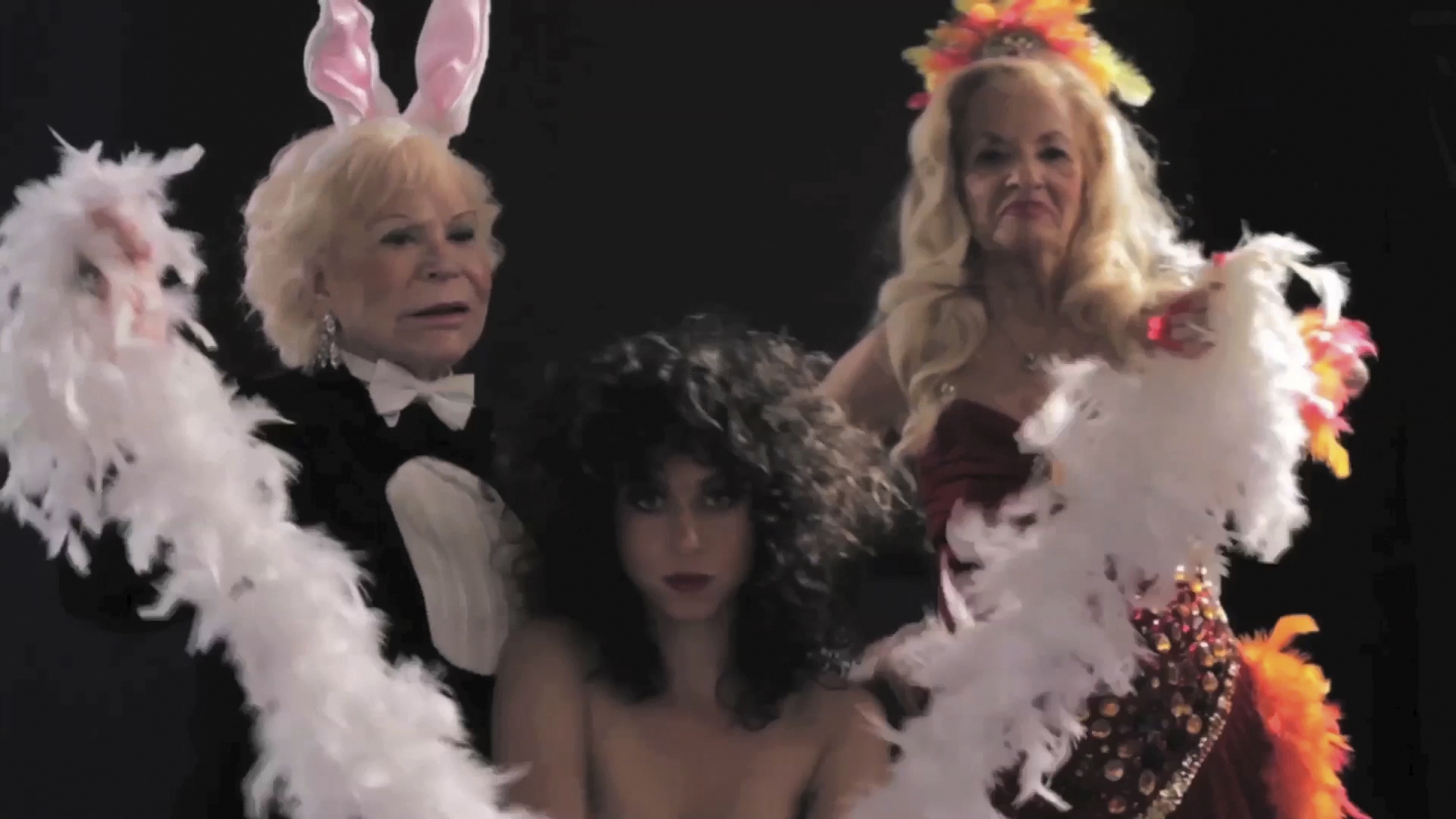 Sarah Nye, video still from "Visual Pleasure/Jukebox Cinema – CALENDAR GIRL (Boa Stroke)," 2014