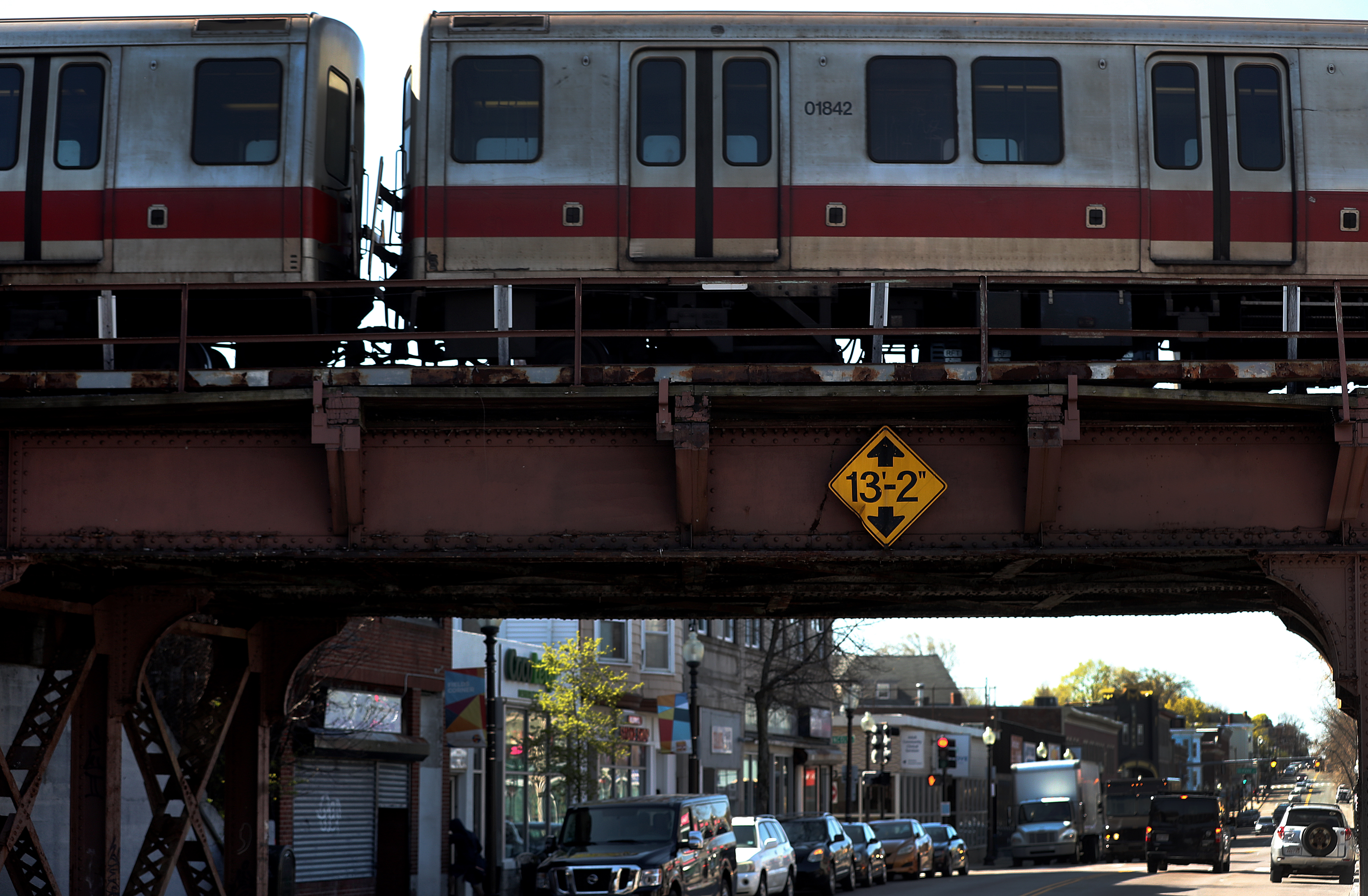 The MBTA Red Line passed overhead across Dorchester Avenue in Fields Corner.