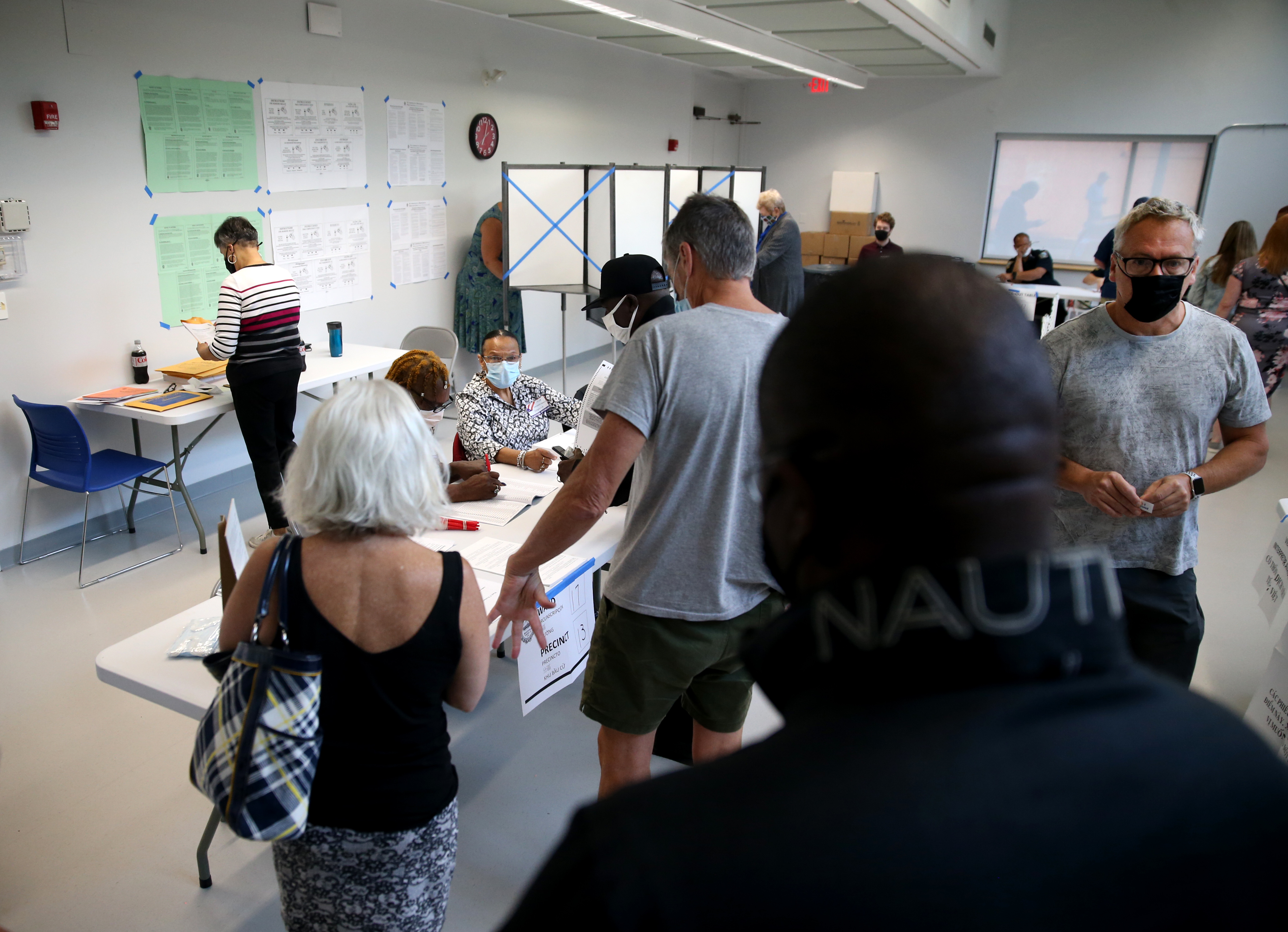 People in line to vote in Lower Mills Library, on 27 Richmond St, Dorchester.