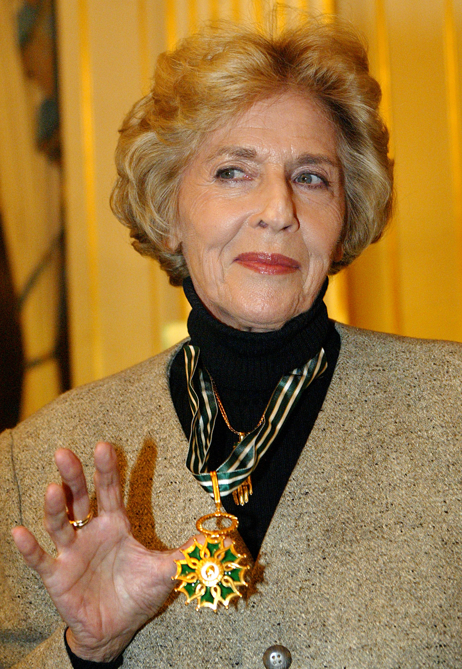 Nelly Kaplan presented with a Commander of Arts and Letters medal in France in 2005.