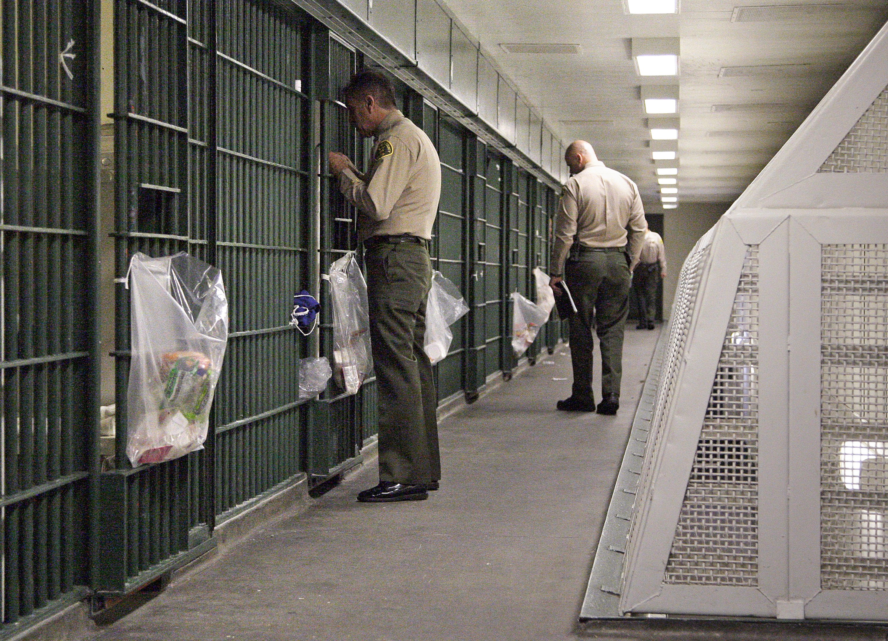 Los Angeles County Sheriff's deputies inspected a cell block at the Men's Central Jail in downtown Los Angeles in 2012.