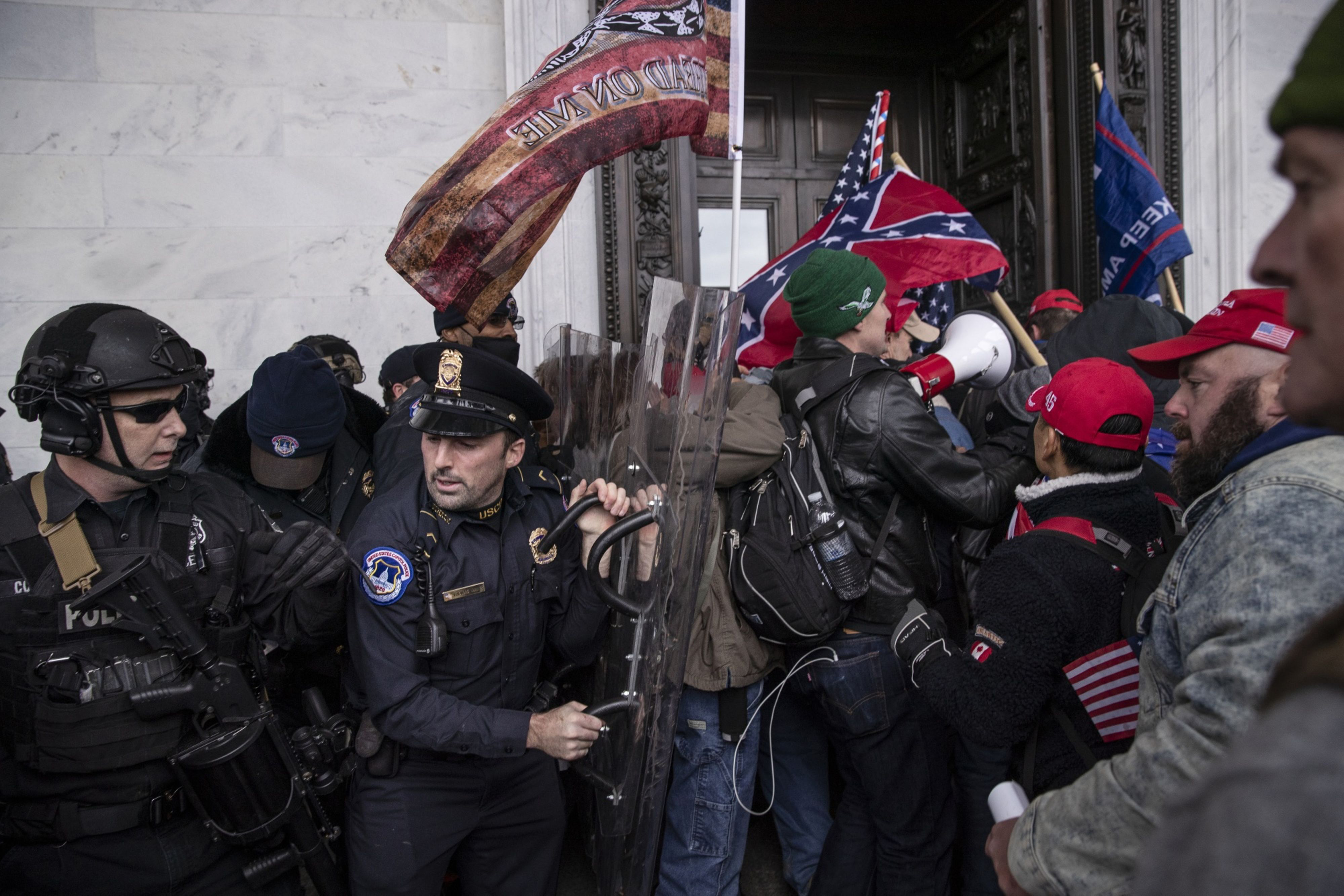 Demonstrators clashed with police officers as they entered the US Capitol building.