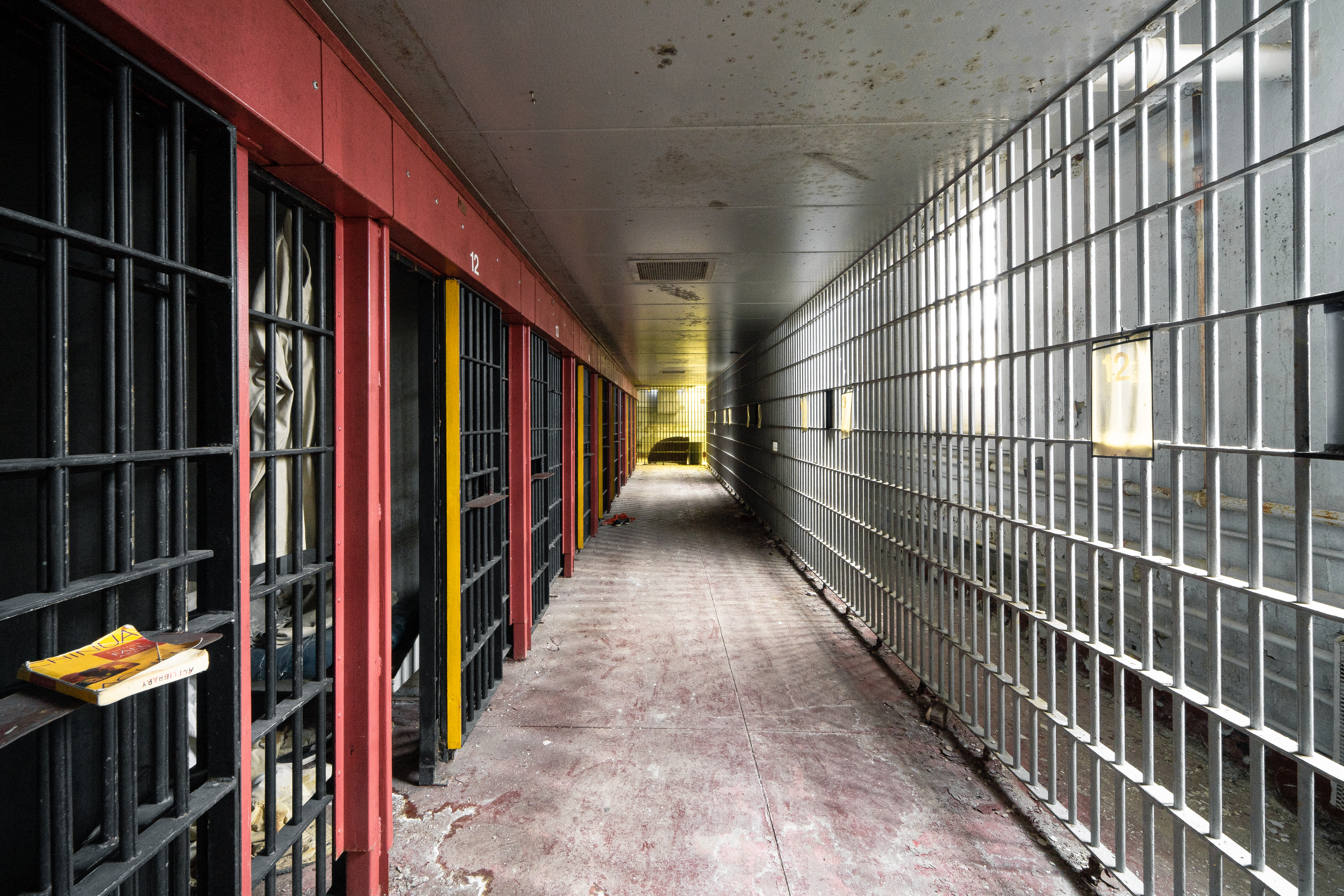 Vacant holding cells in a disused correctional facility in Rhode Island.
