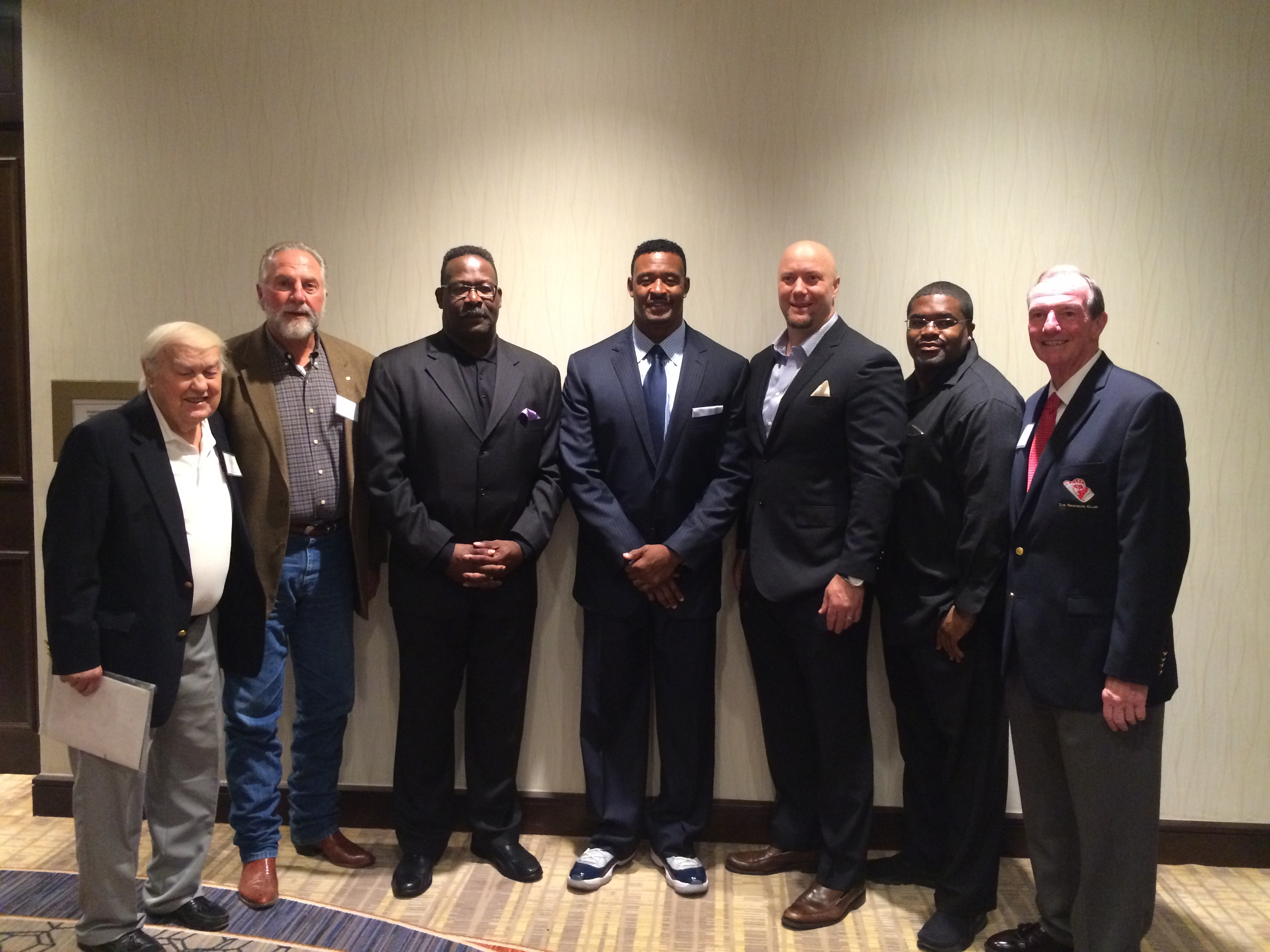 Tom Yewcic (far left) was among the former Patriots to attend the Gridiron Club of Greater Boston's annual NFL Legends night in 2016, joined by Pete Brock, Andre Tippett, Willie McGinest, Matt Chatham, Patrick Pass, and Gridiron Club president Jim Kearney. McGinest won that year's Tom Yewcic Award, given to those whose "careers both on and off the field have been exemplary and inspirational to players and to fans of all ages."