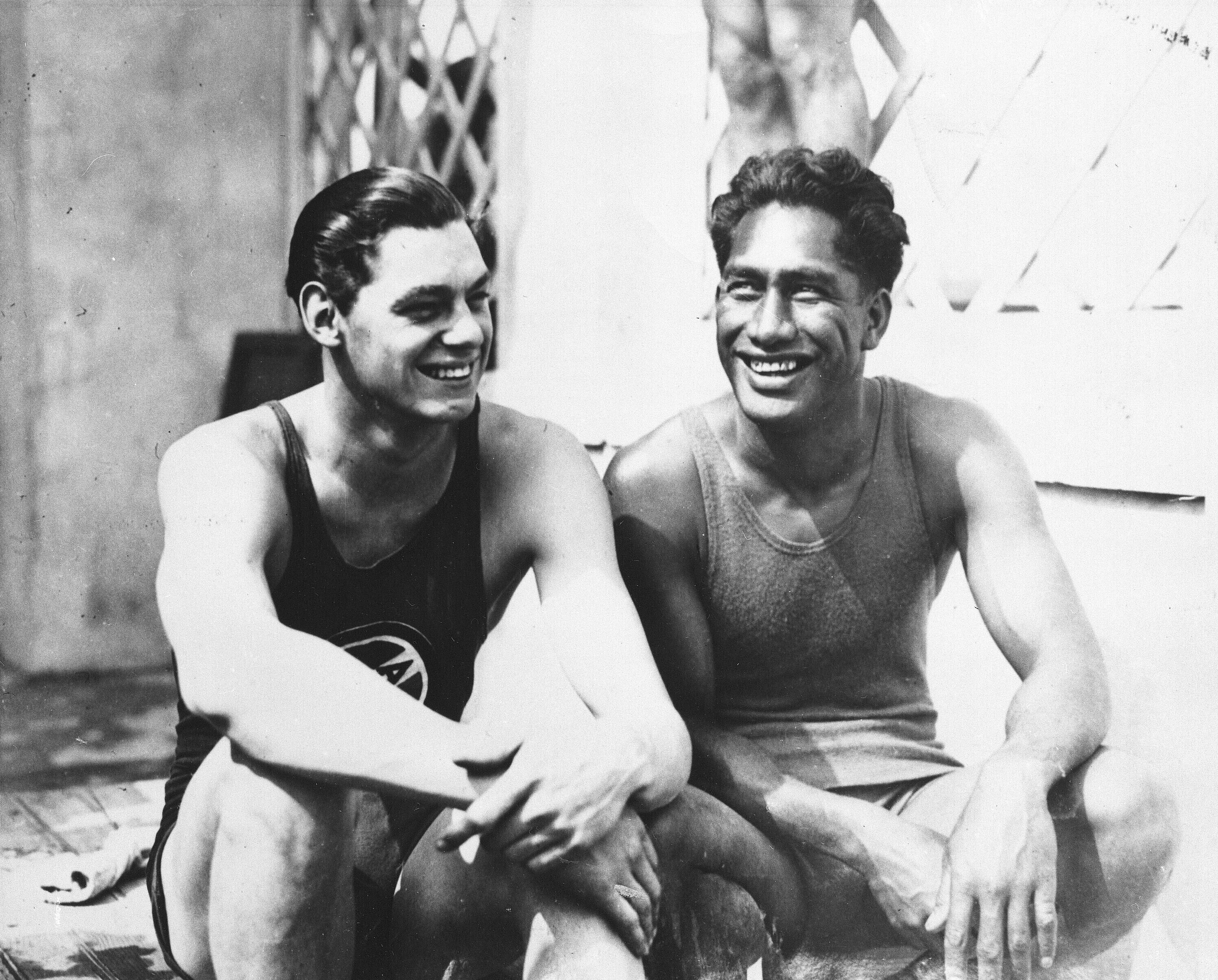Duke Kahanamoku (right) and Johnny Weissmuller are seen at the 1924 Olympic Games in Paris. Kahanmoku competed as a swimmer, but he's now known as the godfather of surfing.