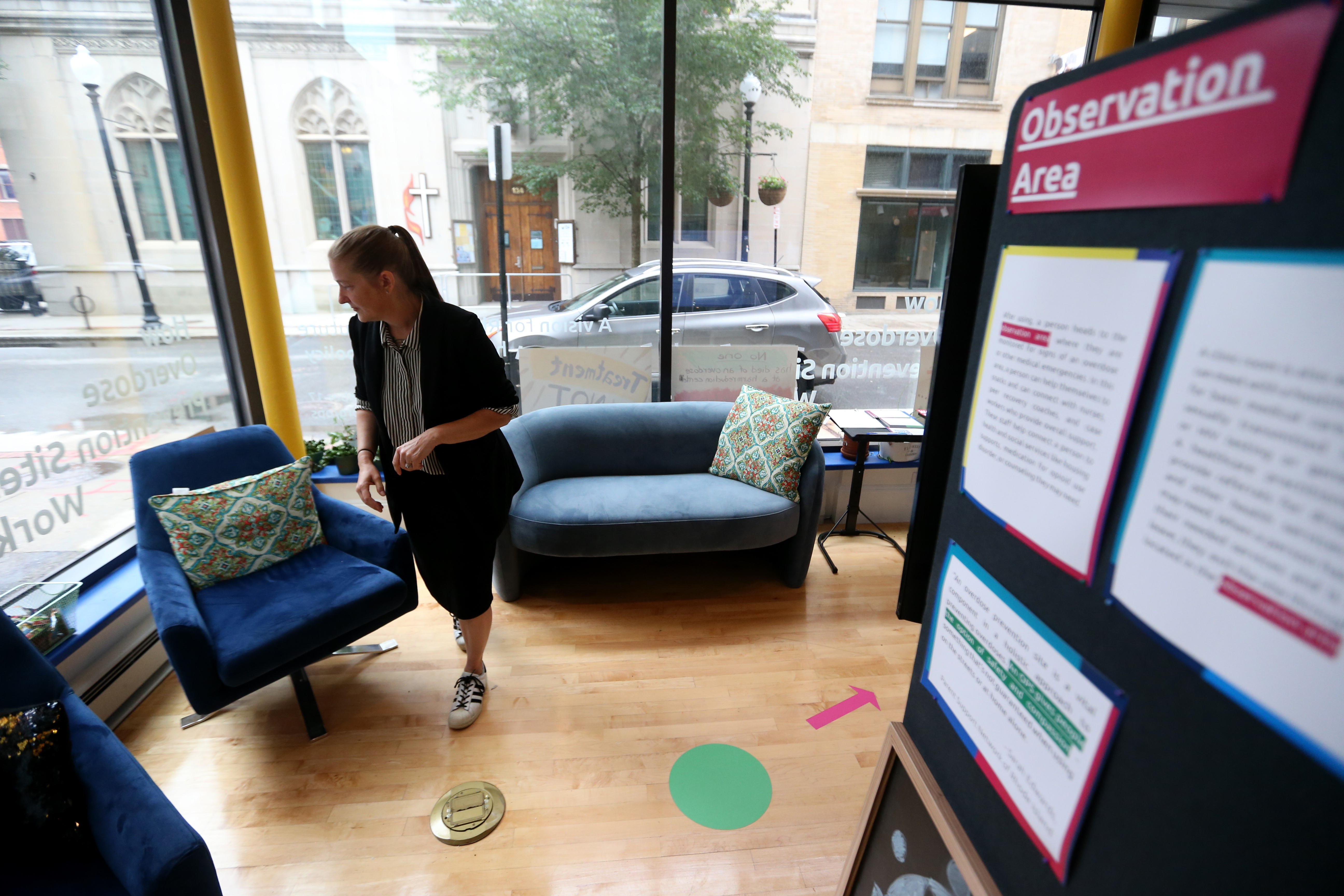 Monica McMyne-Smith, CEO of the group RICARES, gave a tour of an exhibition showing what an overdose prevention site would look like in Rhode Island.