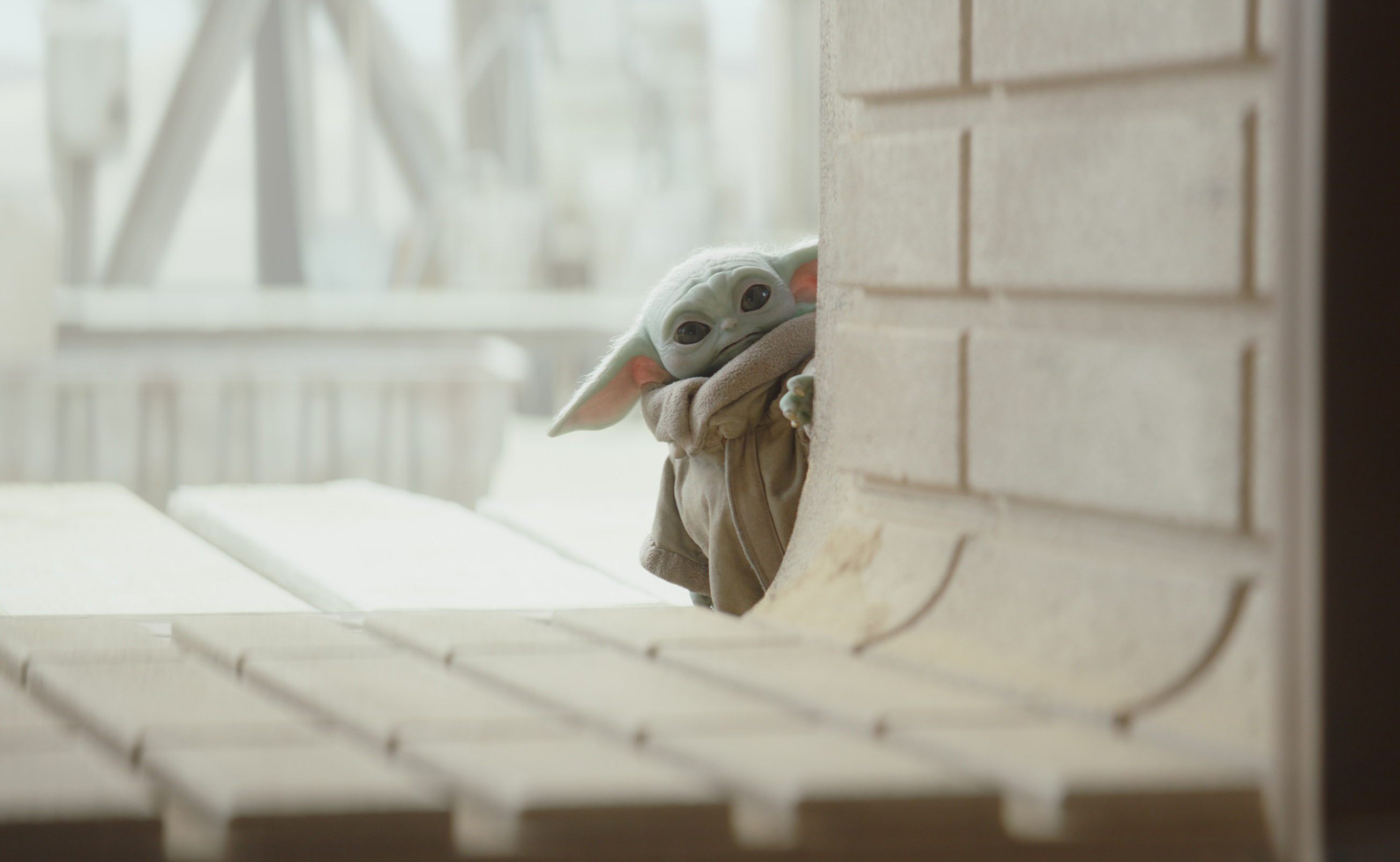 The Child (fans also call him Baby Yoda) is never too far from his Mandalorian protector.