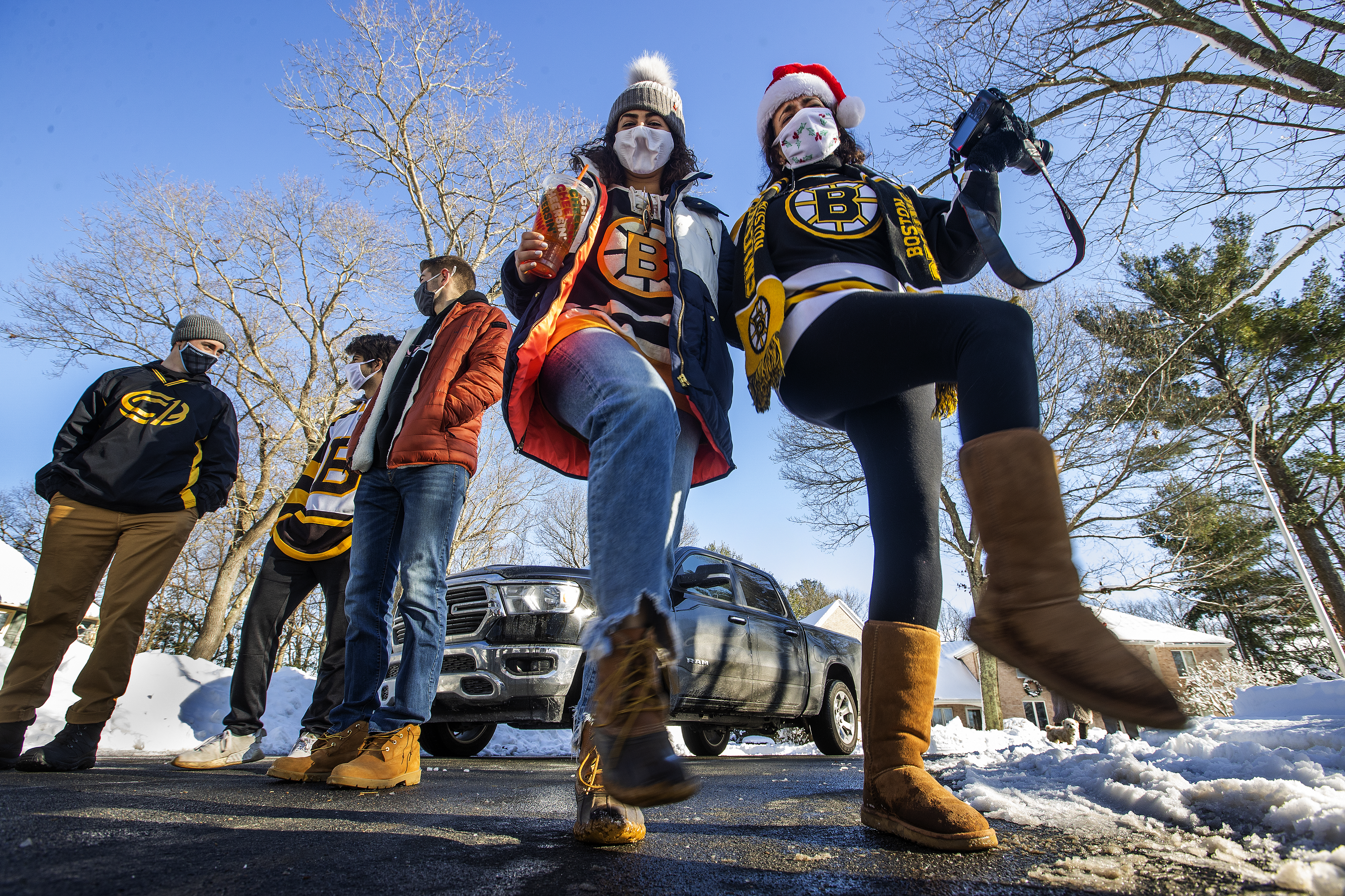 Bruins fans danced to songs sung by Todd Angilly on a stop in Braintree to visit season ticket-holders.