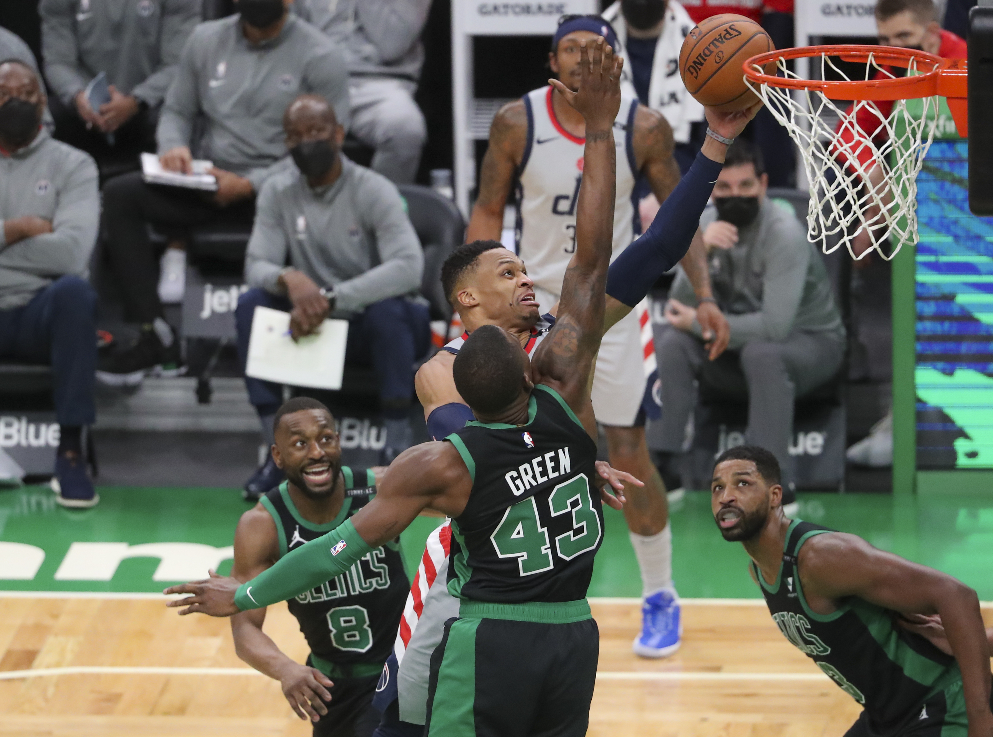 Washington's Russell Westbrook goes strong to the basket in the second quarter of Tuesday's game.
