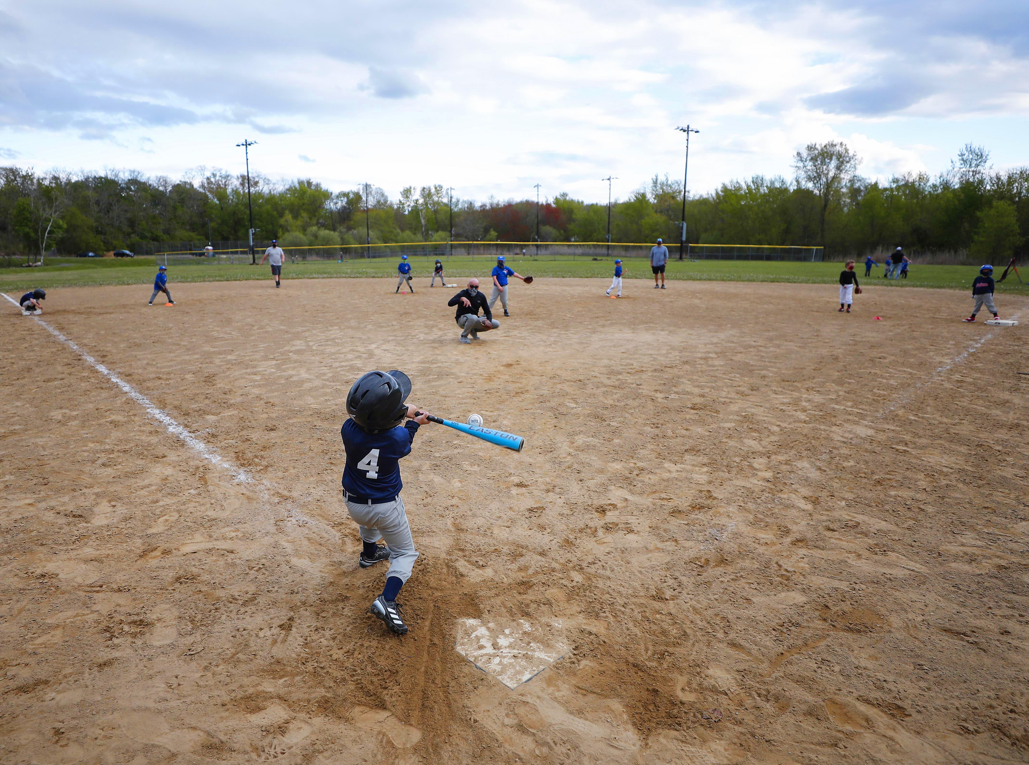 The return of youth baseball brings a sense of normalcy to kids