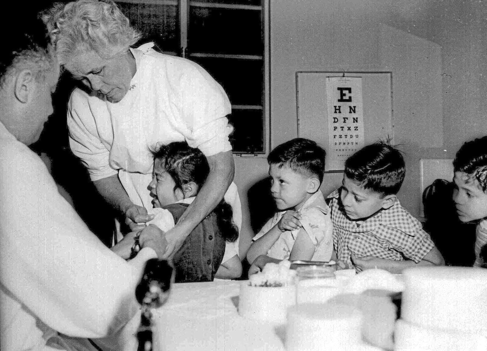 First- and Second-graders at St. Vibiana's school were inoculated against polio with the Salk vaccine in Los Angeles in April 1955.