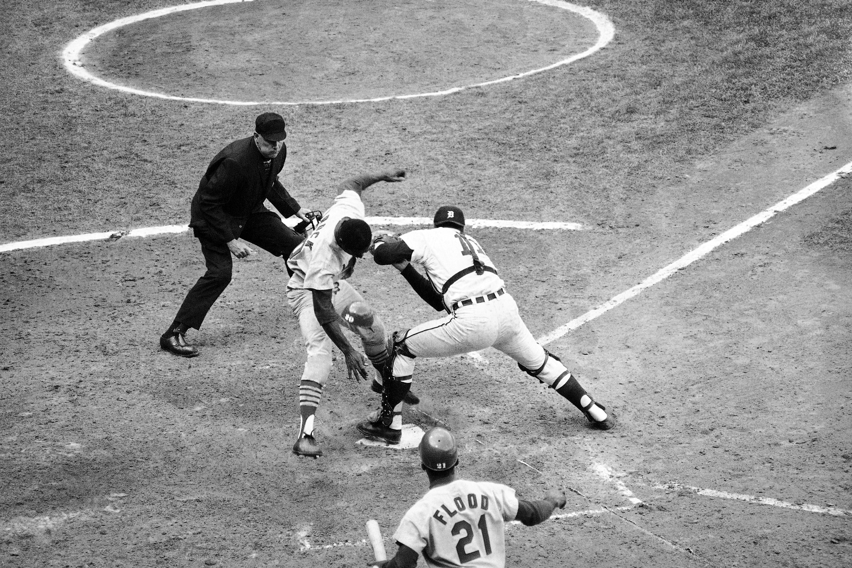 Bill Freehan holds his ground and tags out the Cardinals' Lou Brock at home in Game 5 of the 1968 World Series.