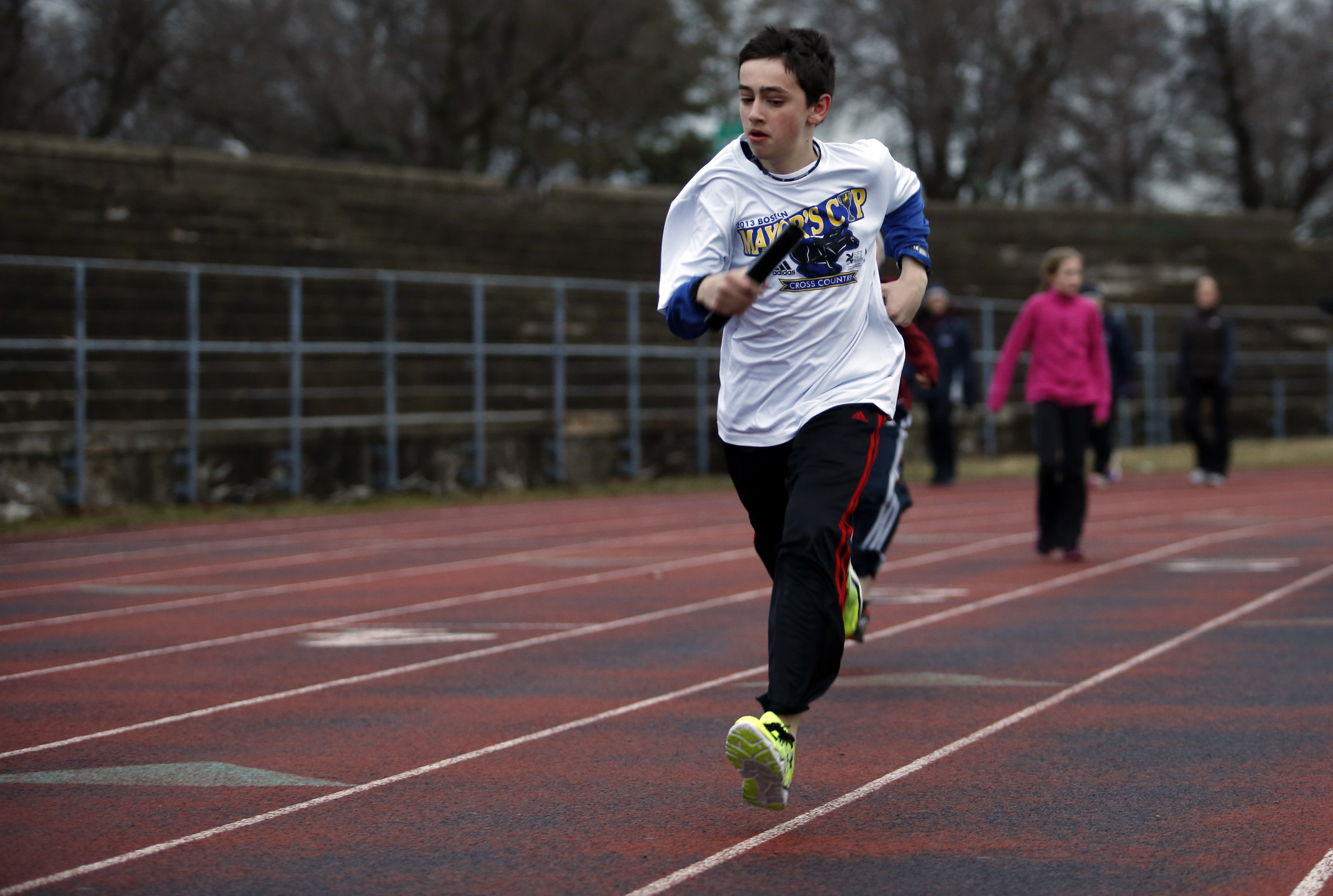 In time, the pace of life and activities resumed. Henry practiced relays with his track team at Joe Moakley Park in South Boston.