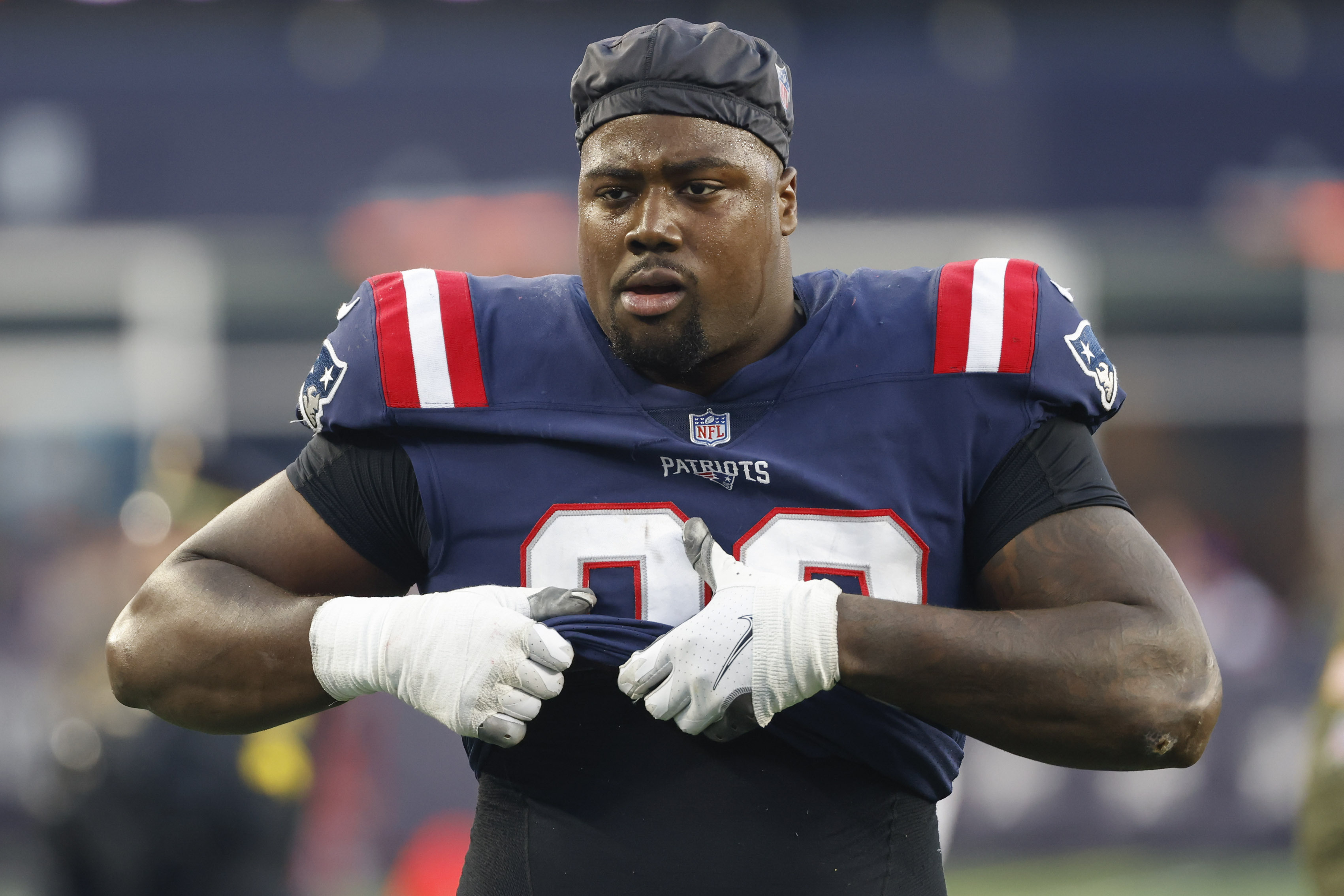 New England Patriots defensive end DaMarcus Mitchell warms up