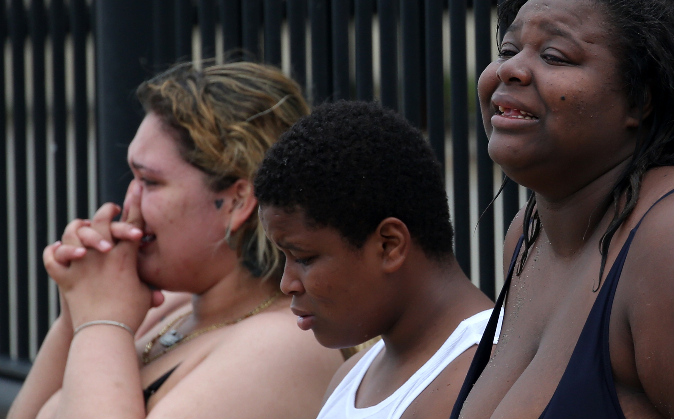 Family members at the scene of the drowning.