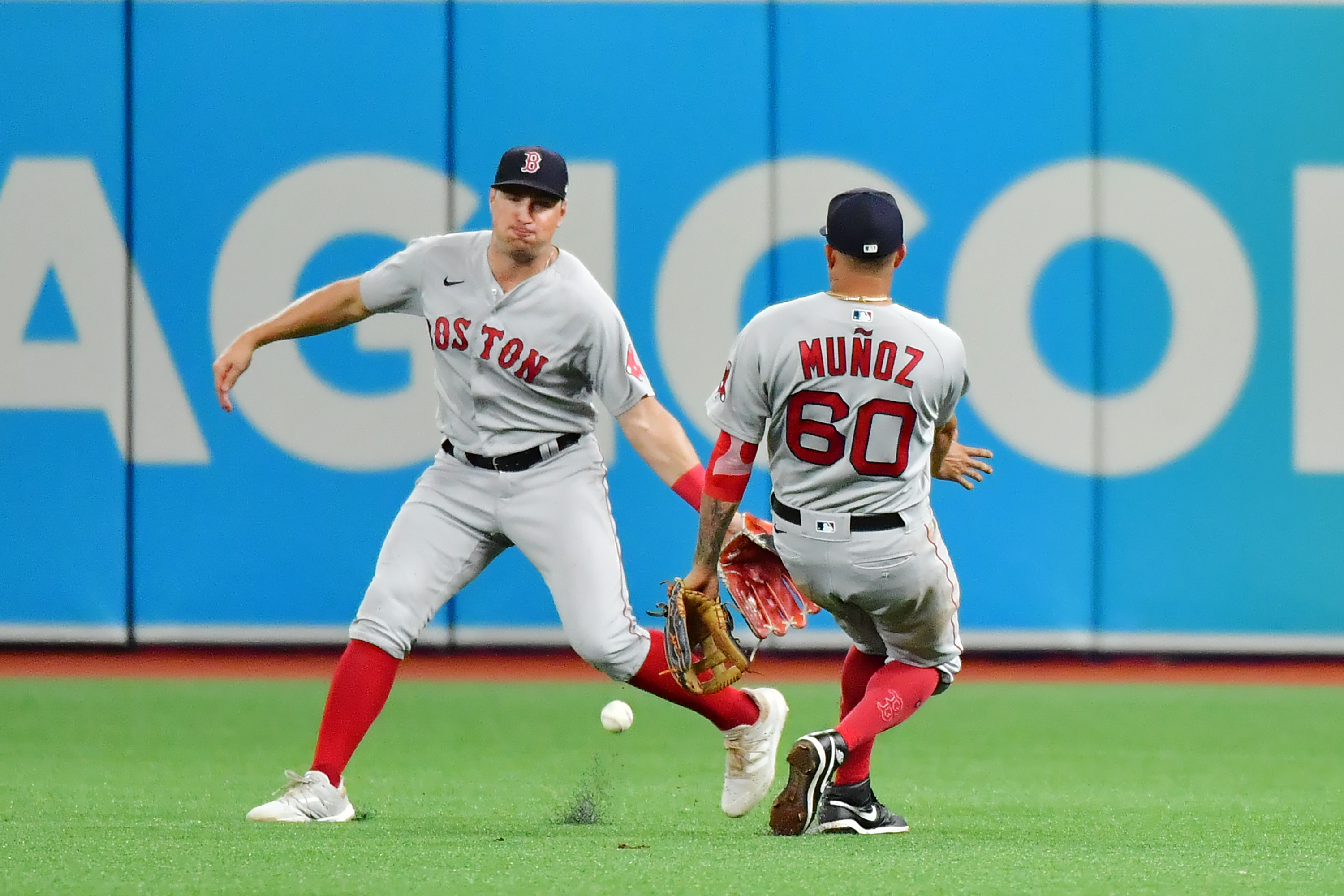 Hunter Renfroe and Yairo Munoz can't come up with this ball hit by Tampa's Yandy Diaz in the third inning of Tuesday's loss.