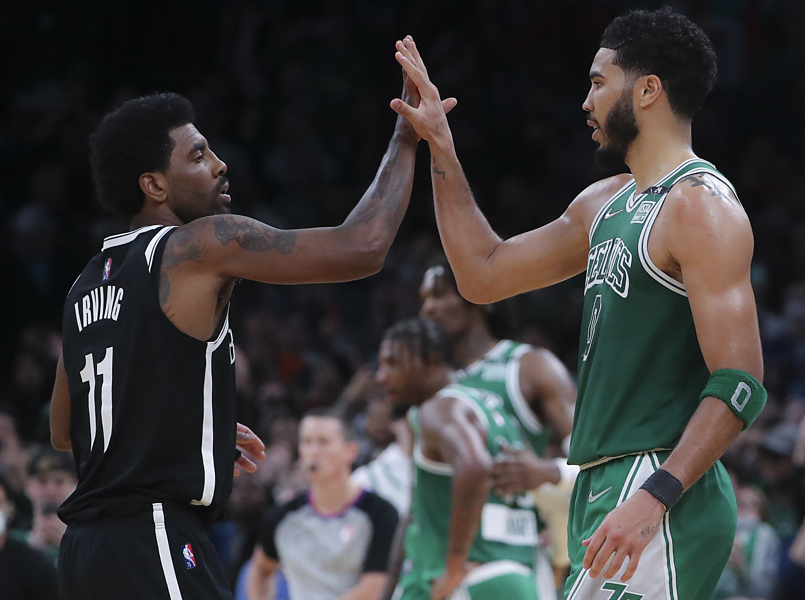 Kyrie Irving has water bottle hurled at him after Nets' victory: It's 'just  underlying racism