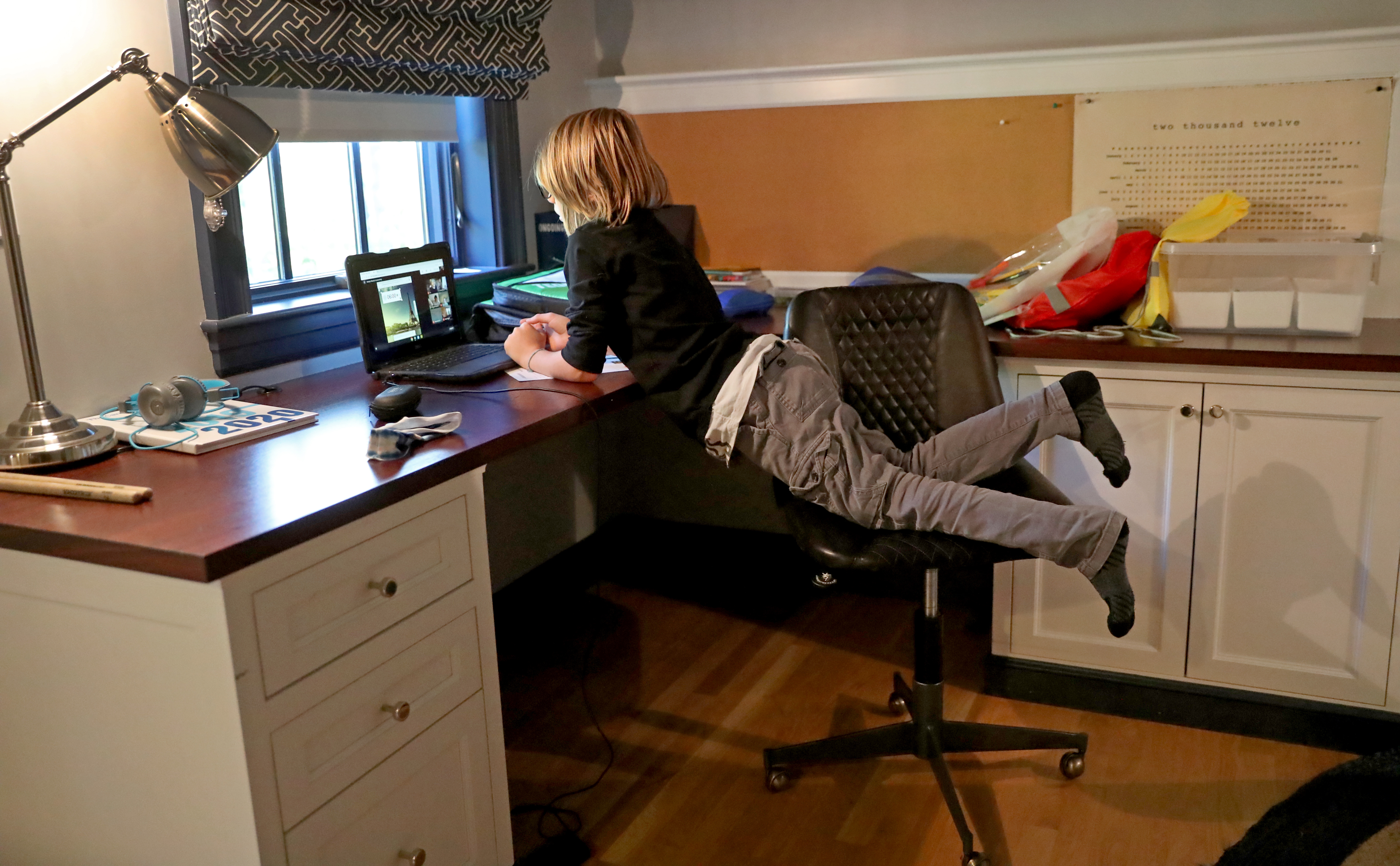 Teddy Turco attends a remote-learning class from home last fall.
