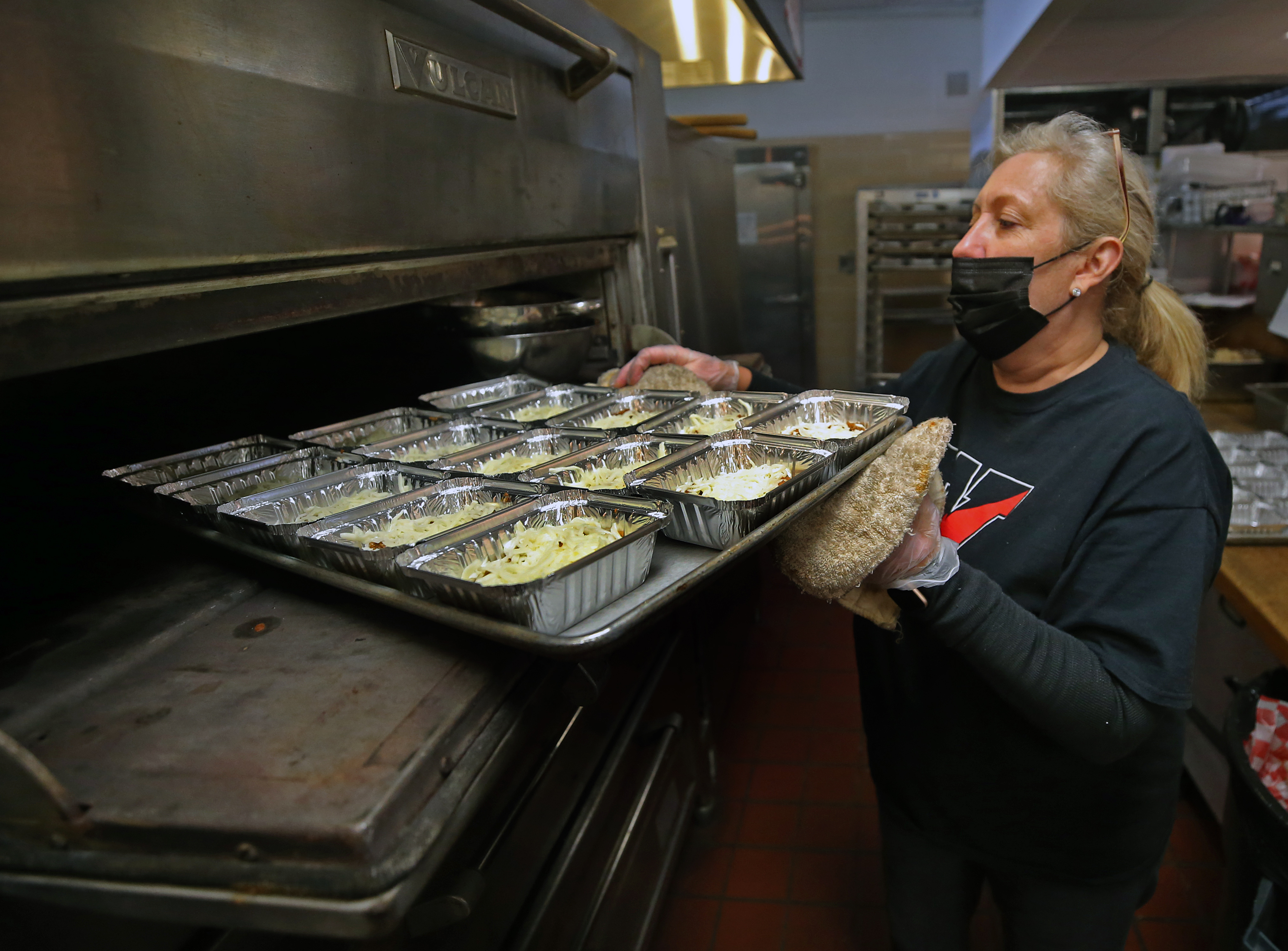 Head cook Sue Demis prepared lunch at Watertown Middle School.