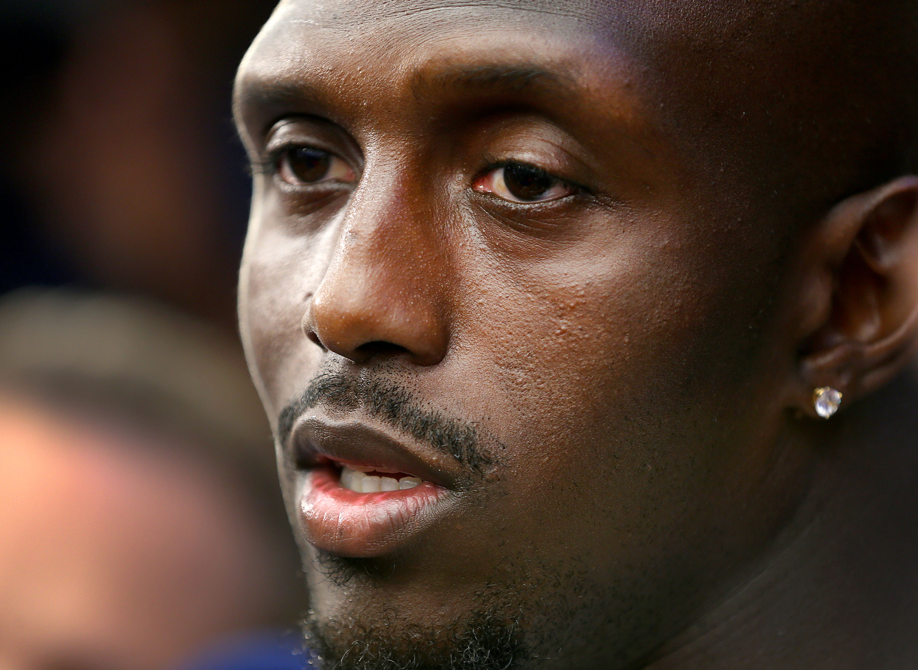 Devin McCourty speaks with reporters before a 2019 practice.