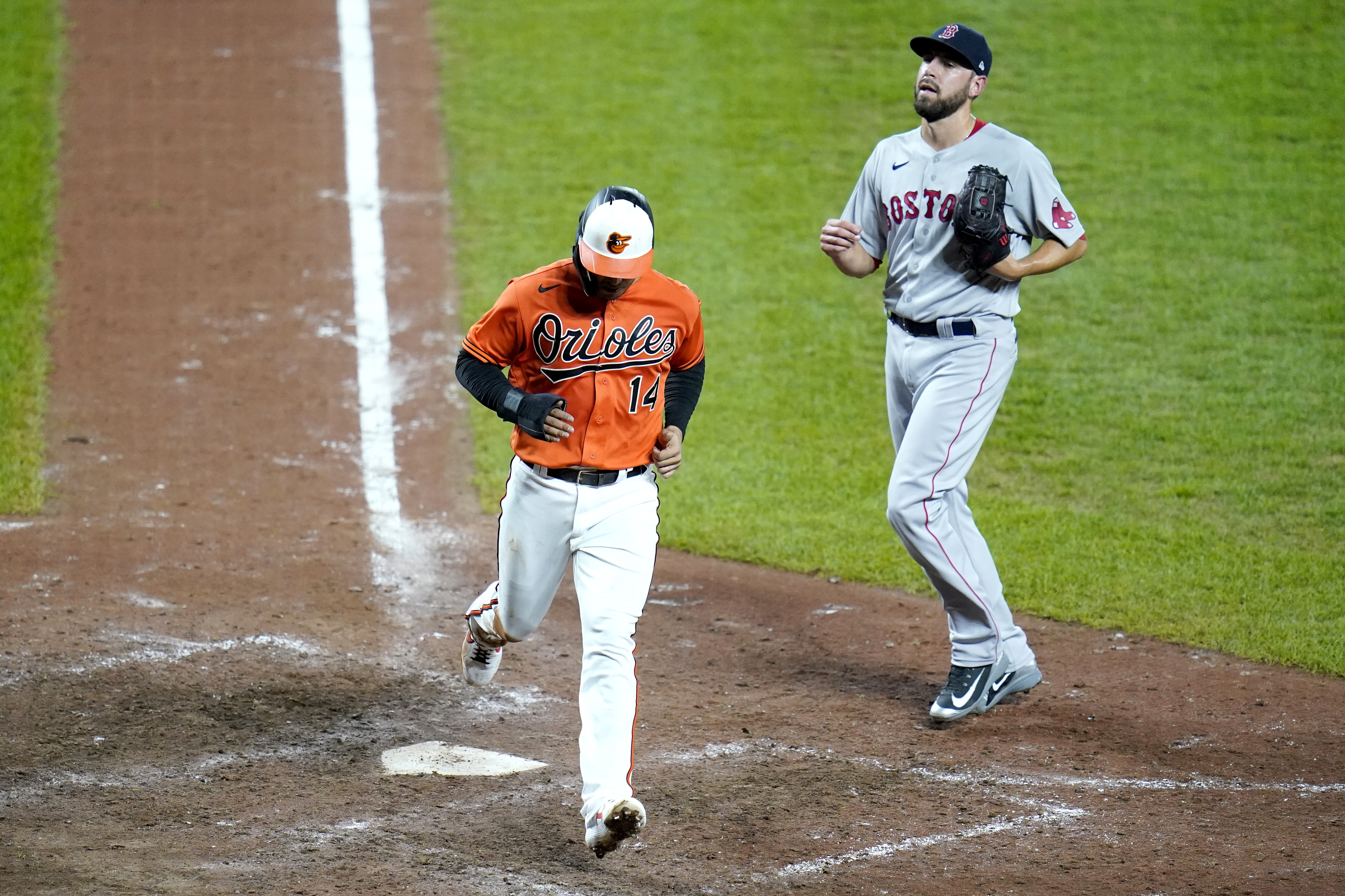 Red Sox score on wild pitch to get another extra-innings win over Orioles