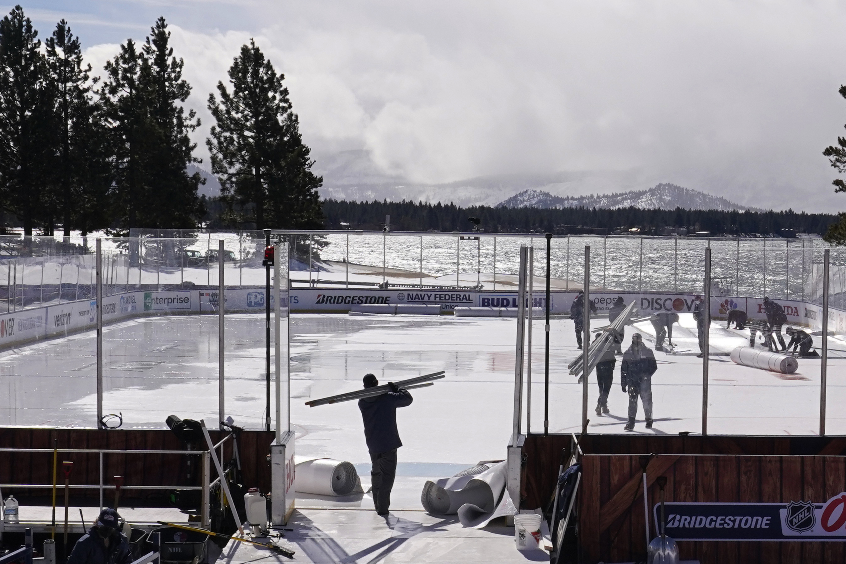 Workers put the finishing touches on the temporary rink at the Edgewood Tahoe Resort where the Bruins will play the Flyers Sunday.