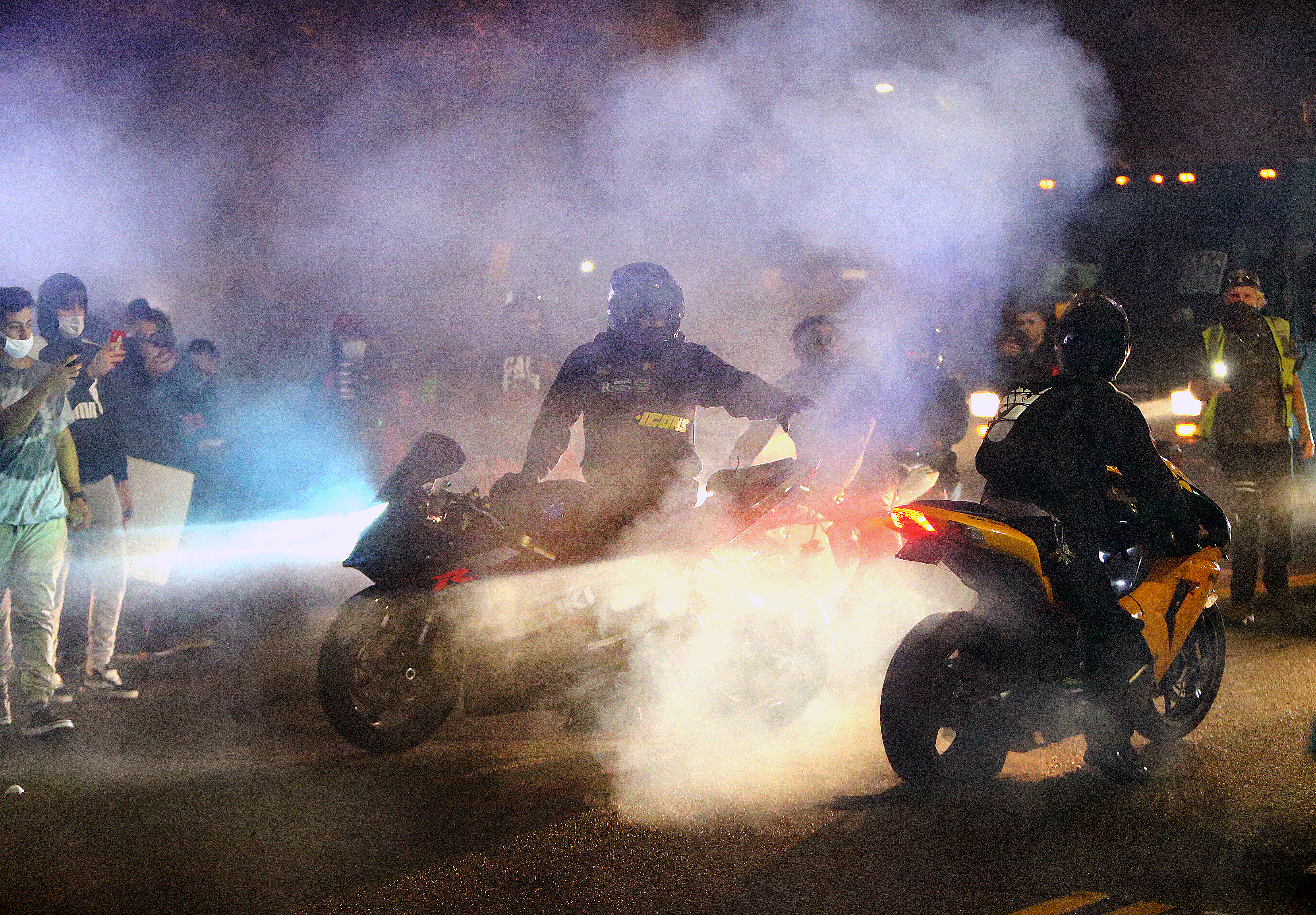 Dirt bike riders "burned out" during a "Speakout" protest against the Providence Police outside Knight Memorial Library last fall.