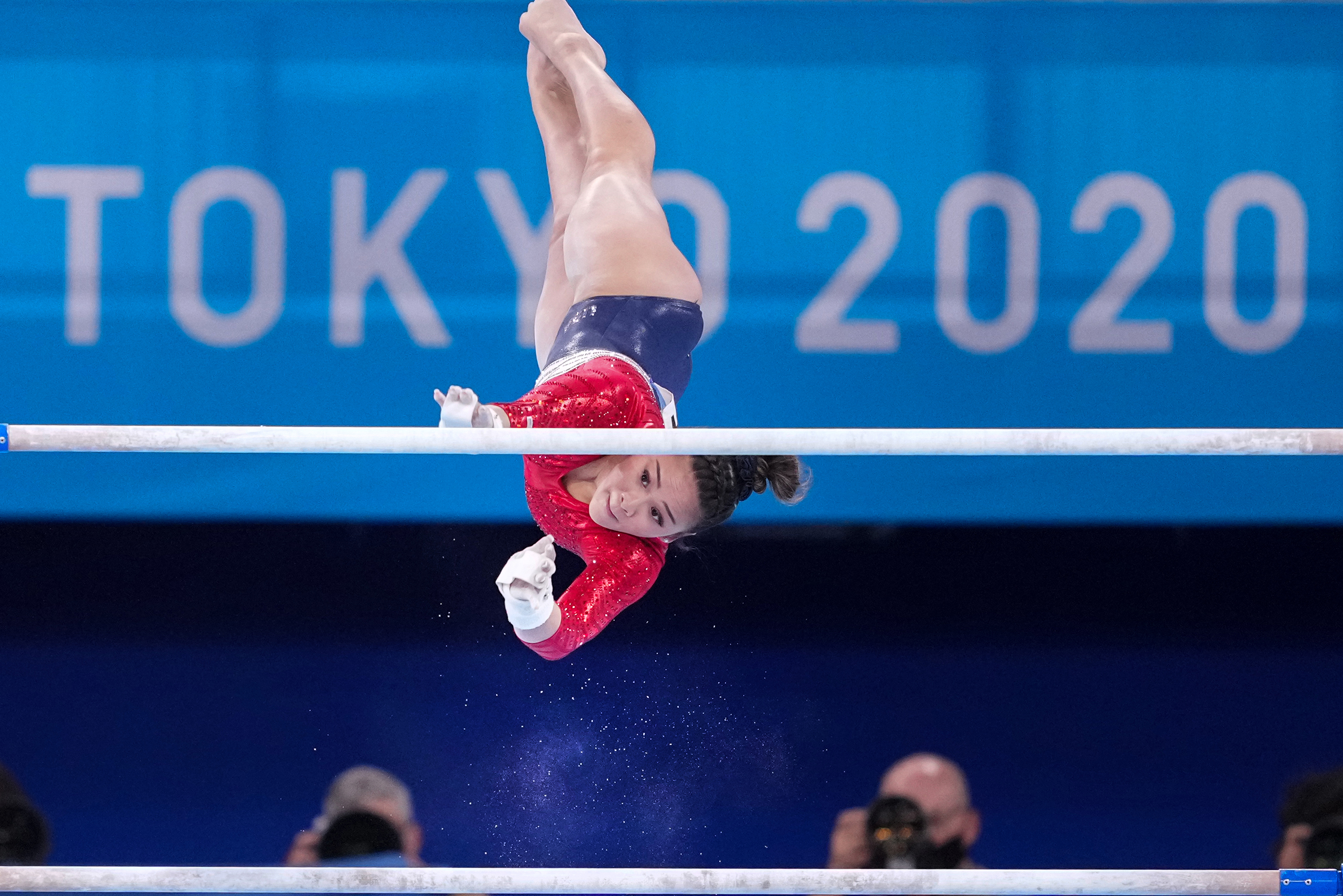 Sunisa Lee competes on the uneven bars.