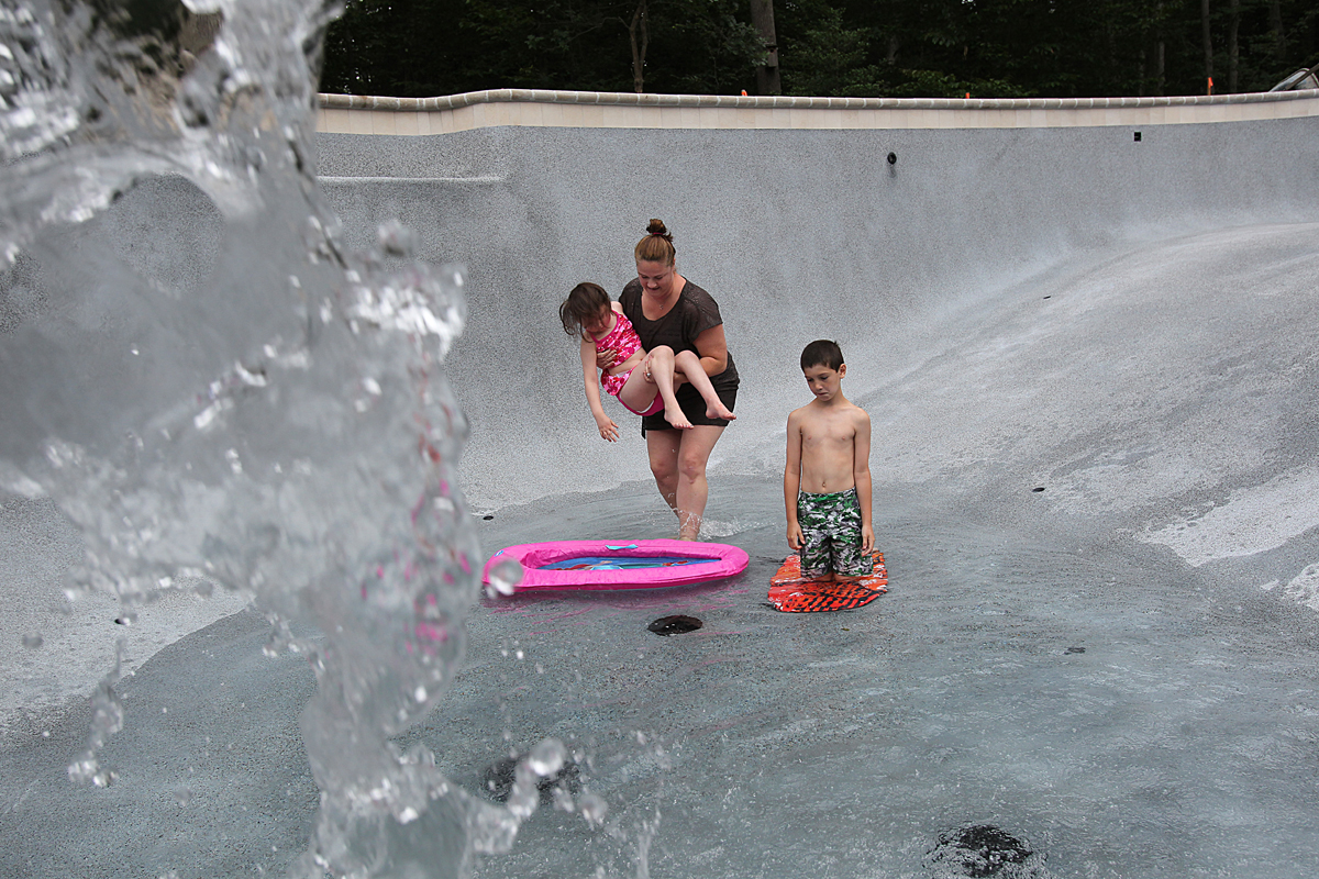 A crew rushed to install a pool Rachael and Kevin wanted because Caroline had always been drawn to water. When it was done in July, Rachael, Caroline, and her brother Connor ventured in.