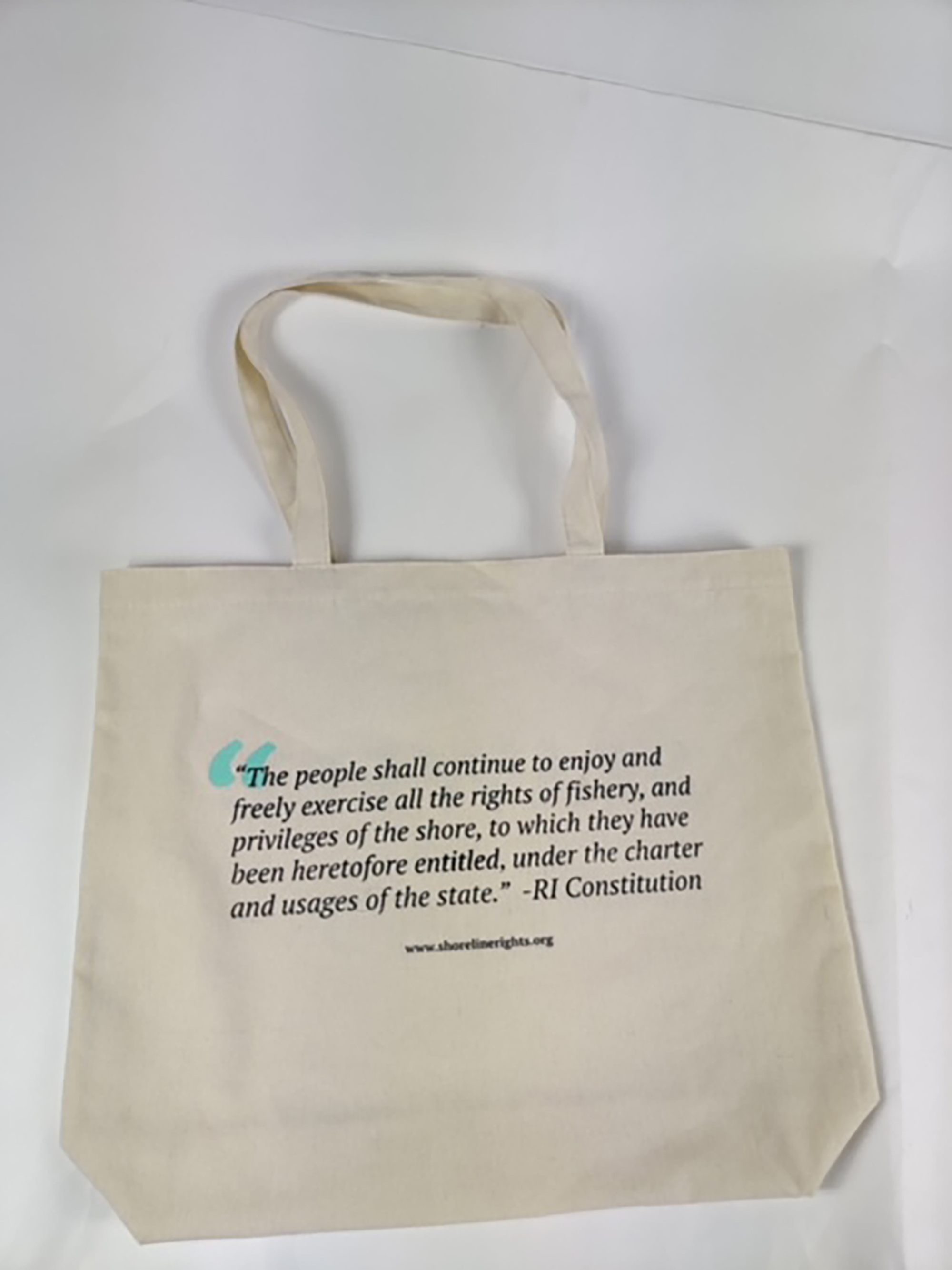 Scott Keeley's seaweed collection bags drive home the fact that the state's constitution allows residents to access certain parts of the Rhode Island shoreline.
