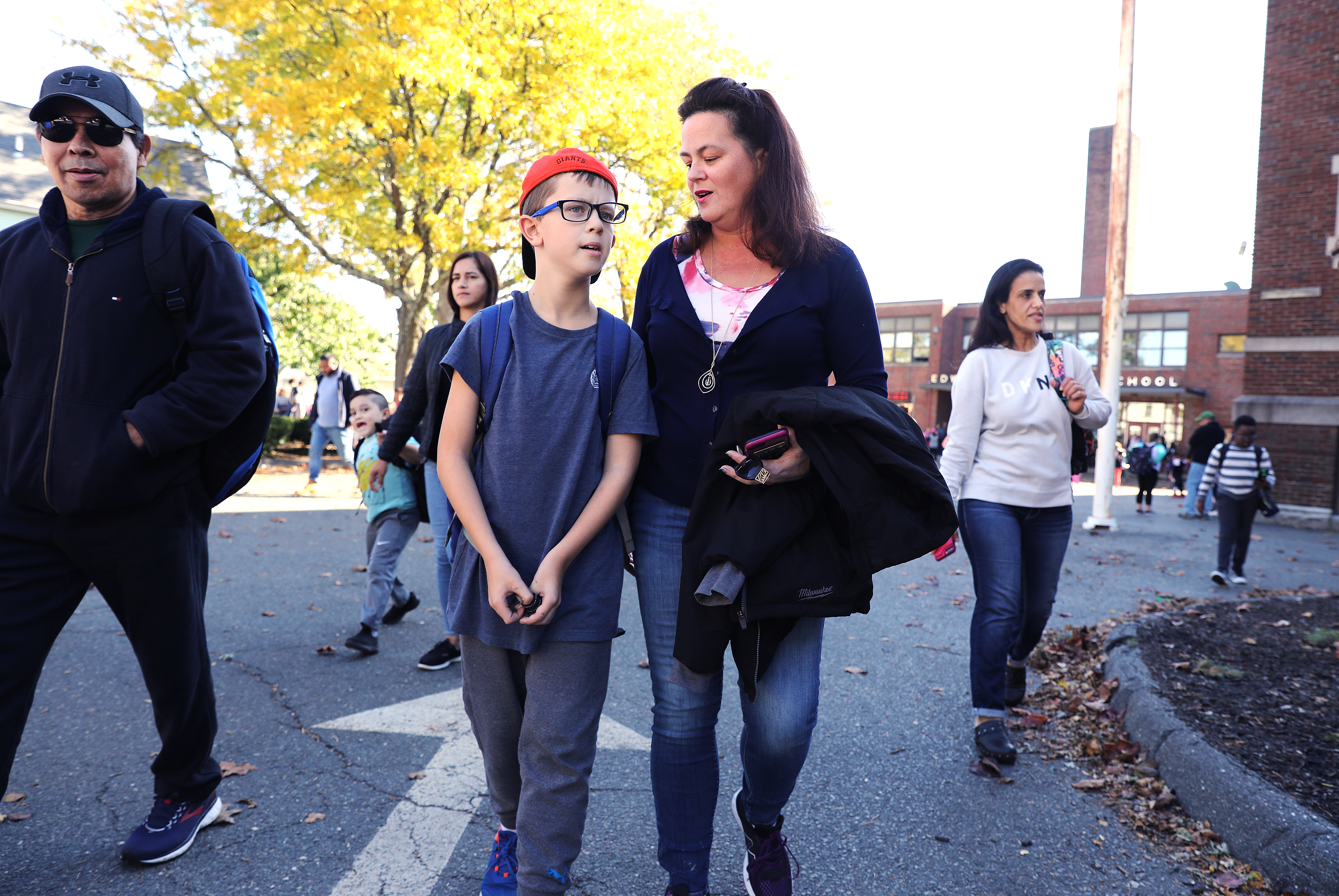 Joy Bartlett picked up her 10-year-old son Joey from the Edward A. Sisson School in Lynn.