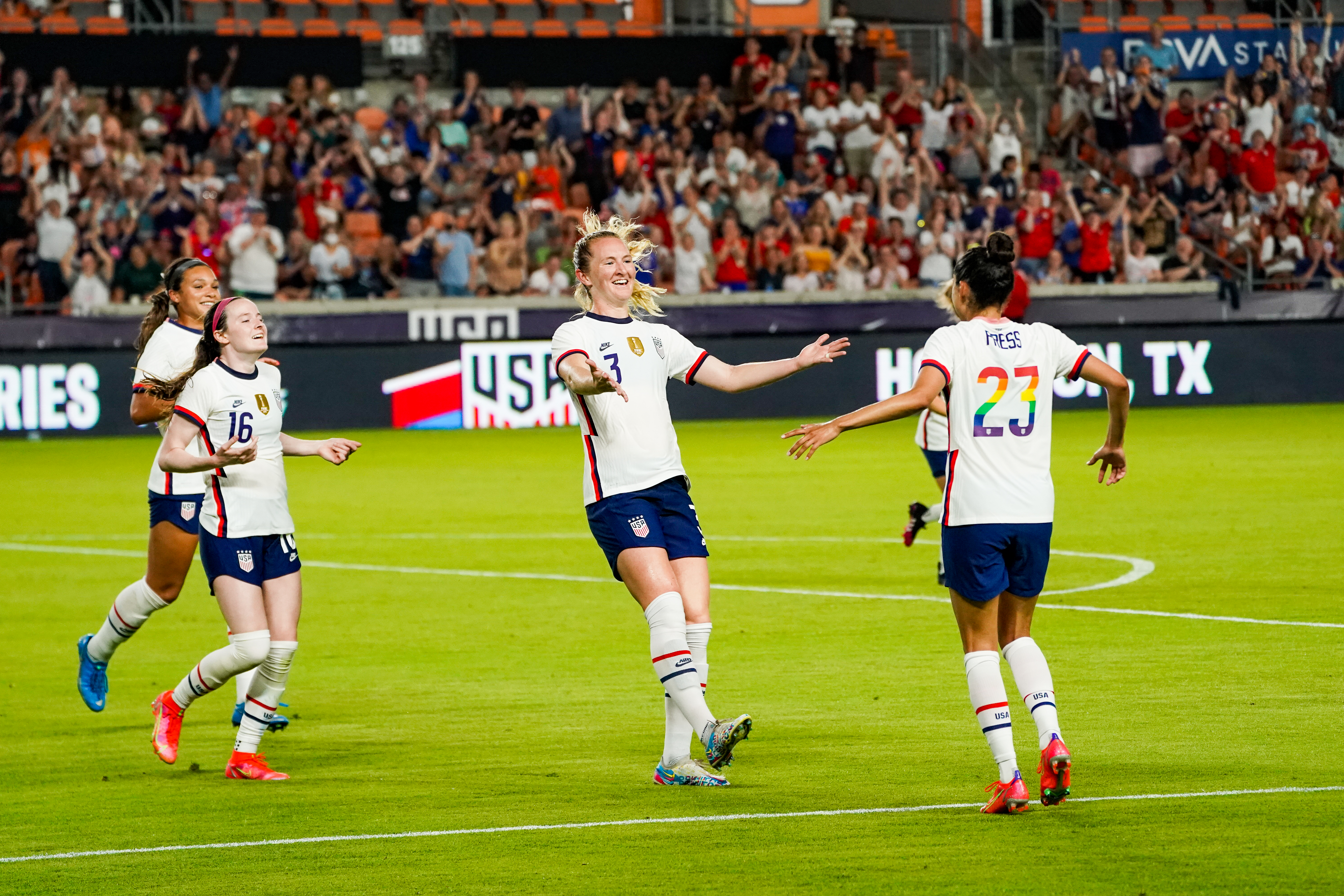 Sam Mewis (center) celebrates her winning goal against Portugal in Thursday's friendly.