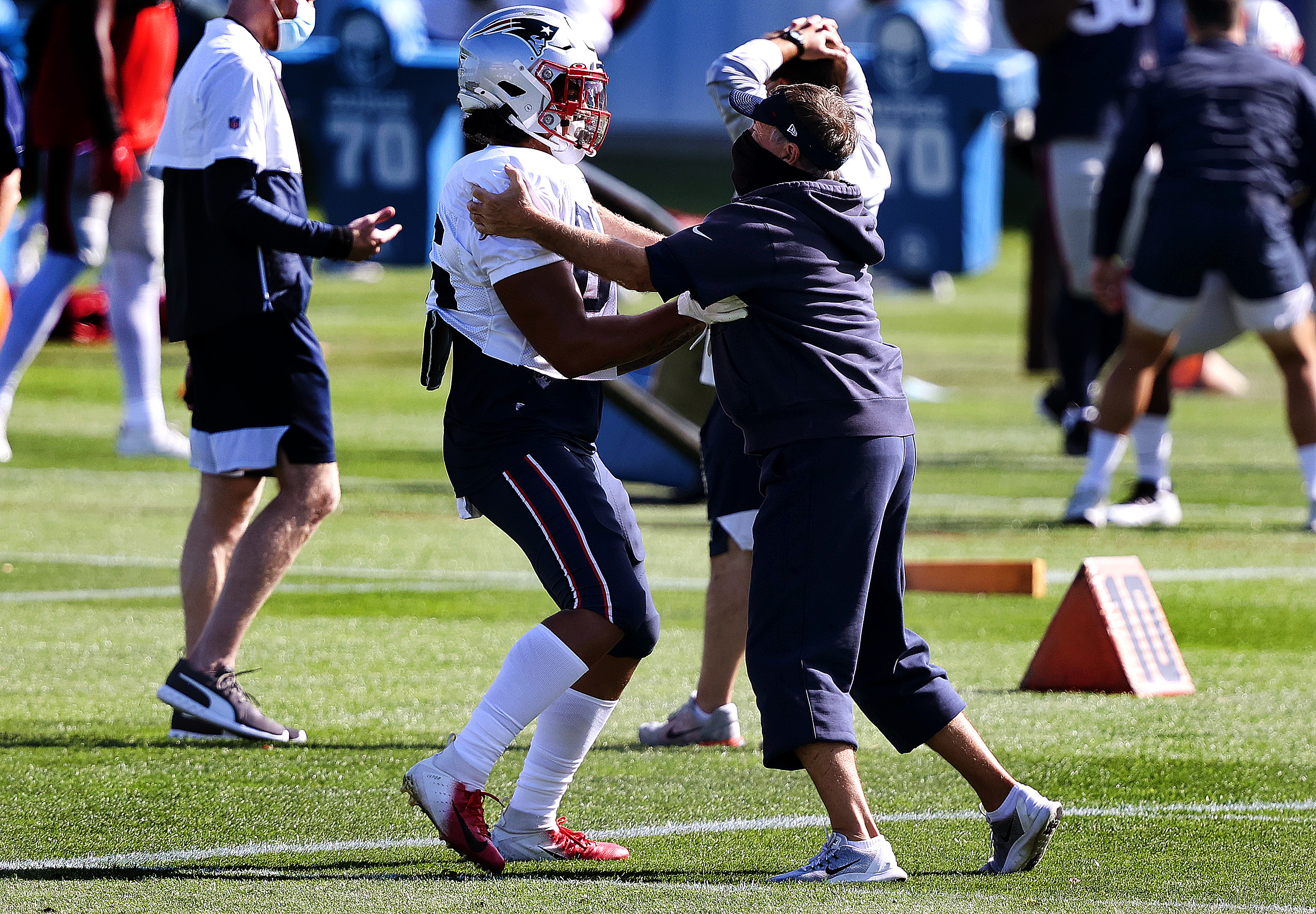Tight end Devin Asiasi got some hands-on instruction from Bill Belichick.