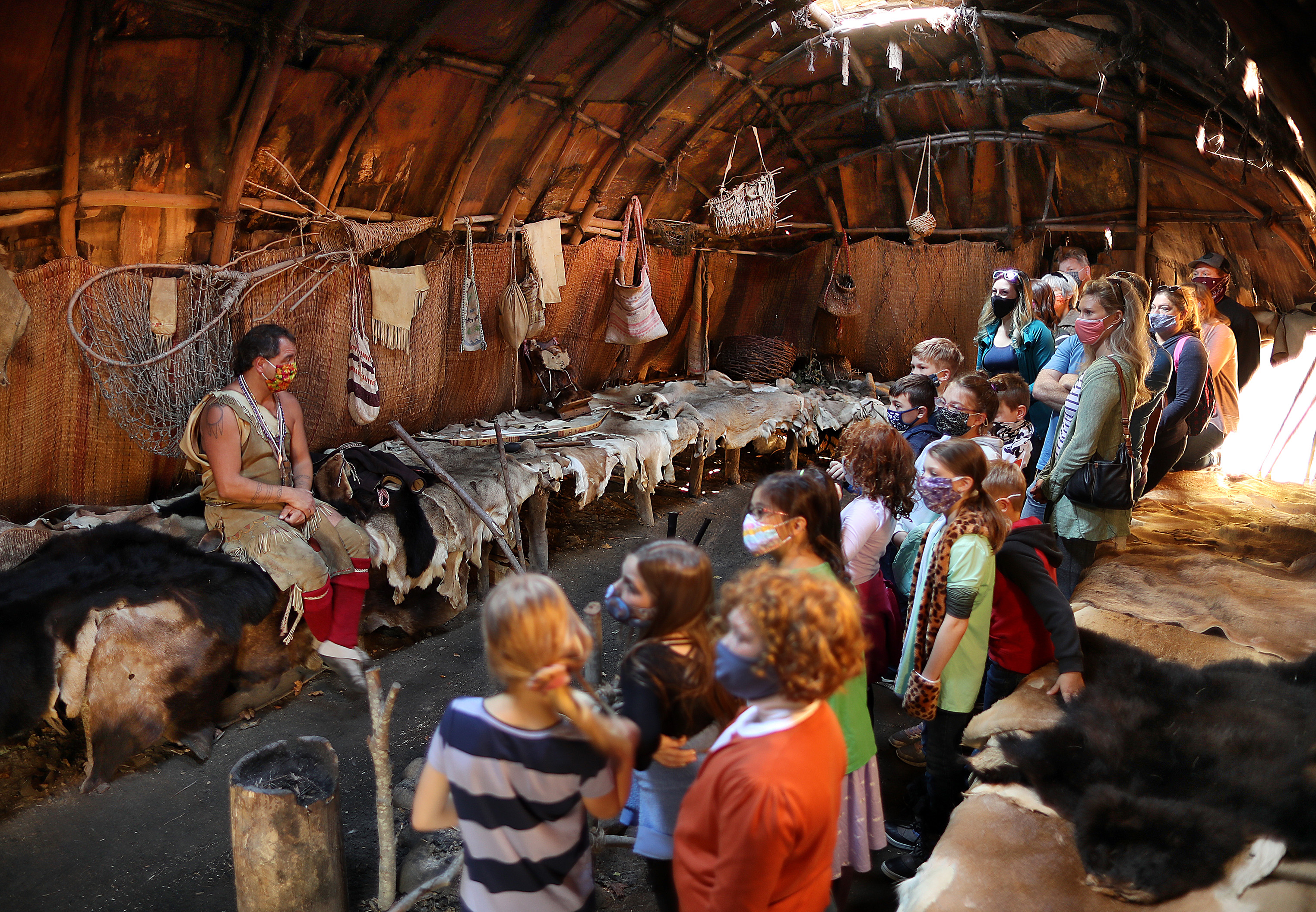Museum educator Tim Turner led a group inside the nush wetu (or winter house) this month at Plimoth Patuxet Museums. “We have the longest living-history Indigenous program in the US,” said Darius Coombs, who leads the museum's Wampanoag scholarship and performance initiatives.