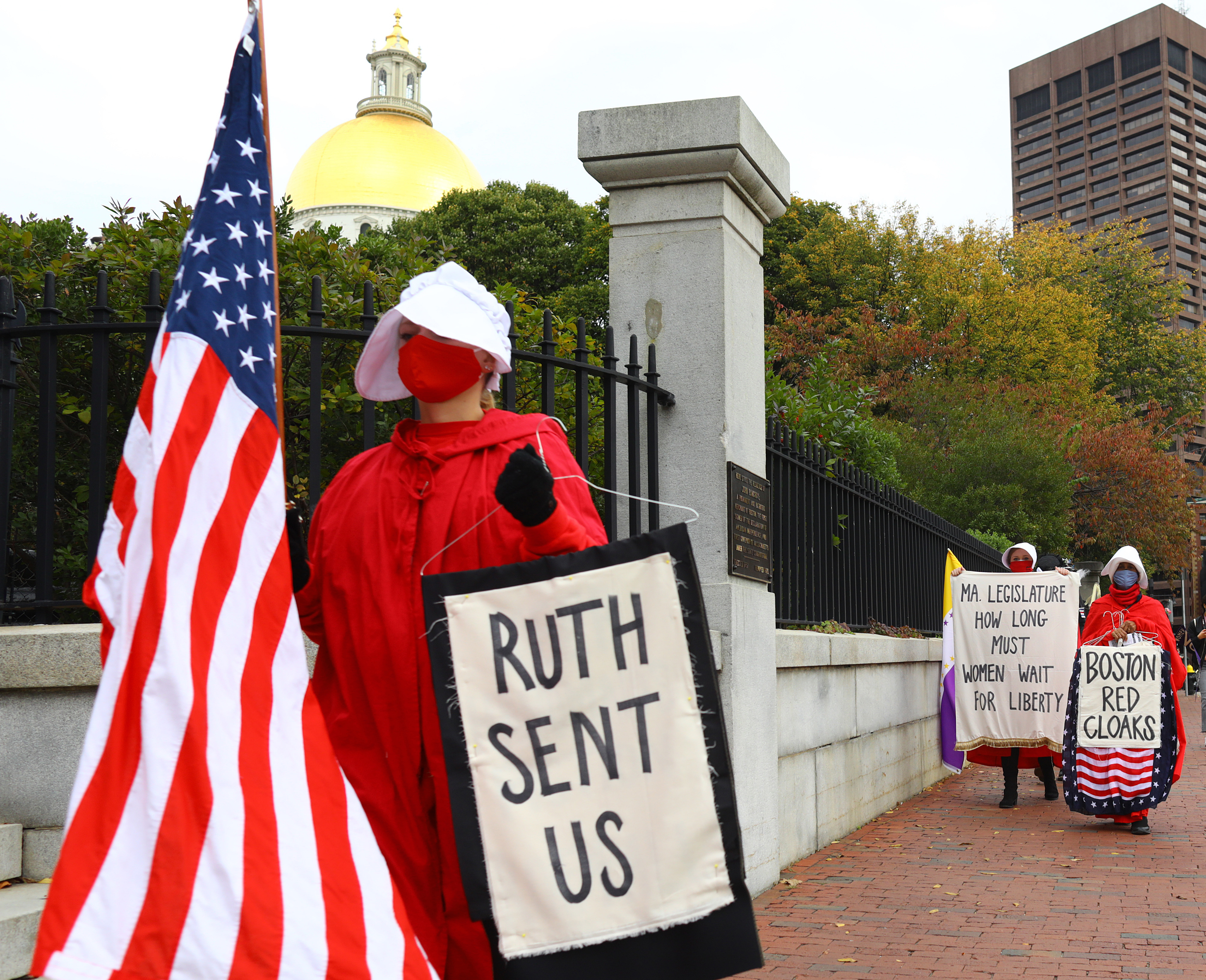 Women In Red Cloaks March On State House Advocate For Reproductive Freedom The Boston Globe