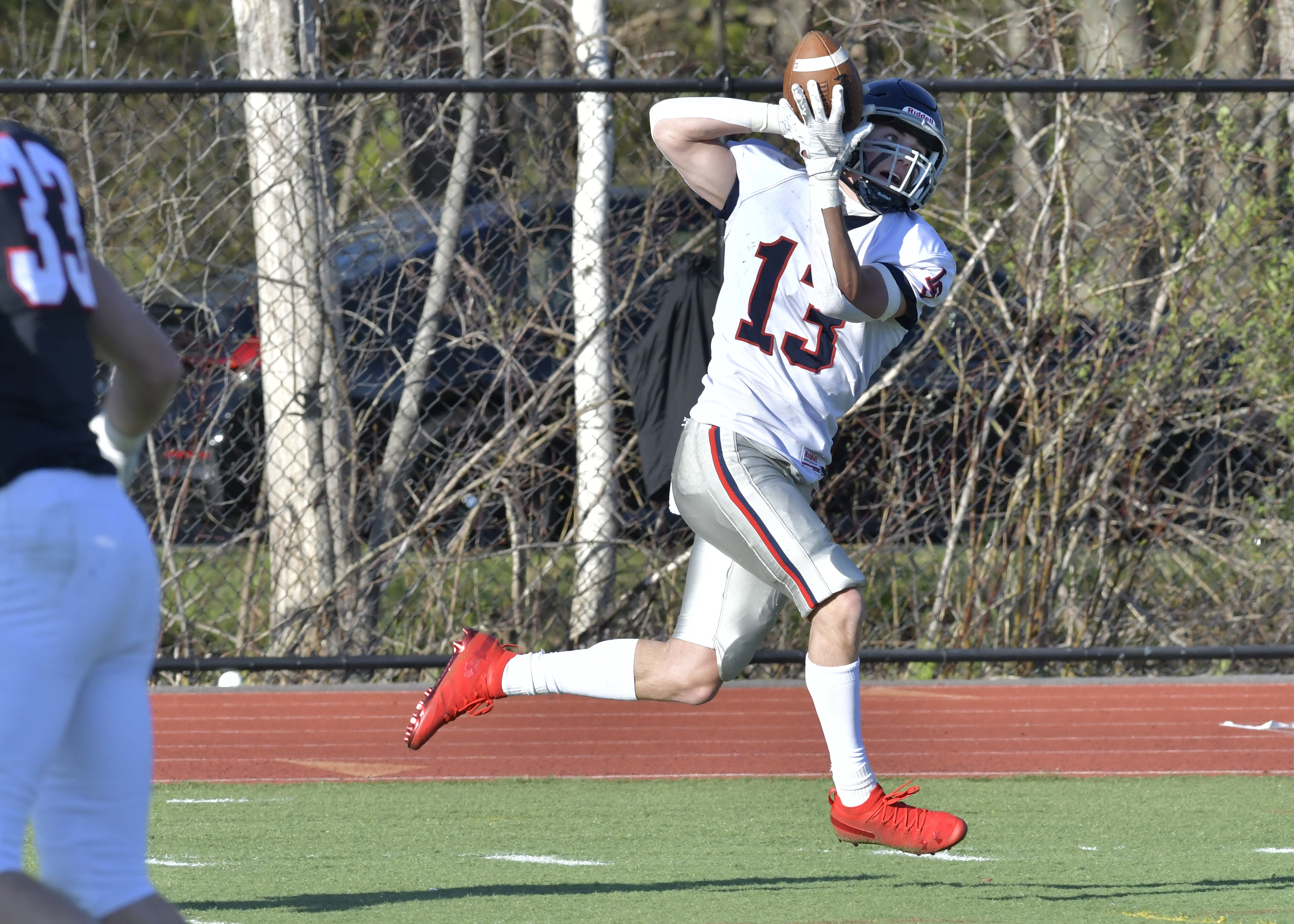 Jack Malone's 44-yard touchdown reception was part of a huge offensive outburst for No. 5 Lincoln-Sudbury in its win over seventh-ranked Reading.
