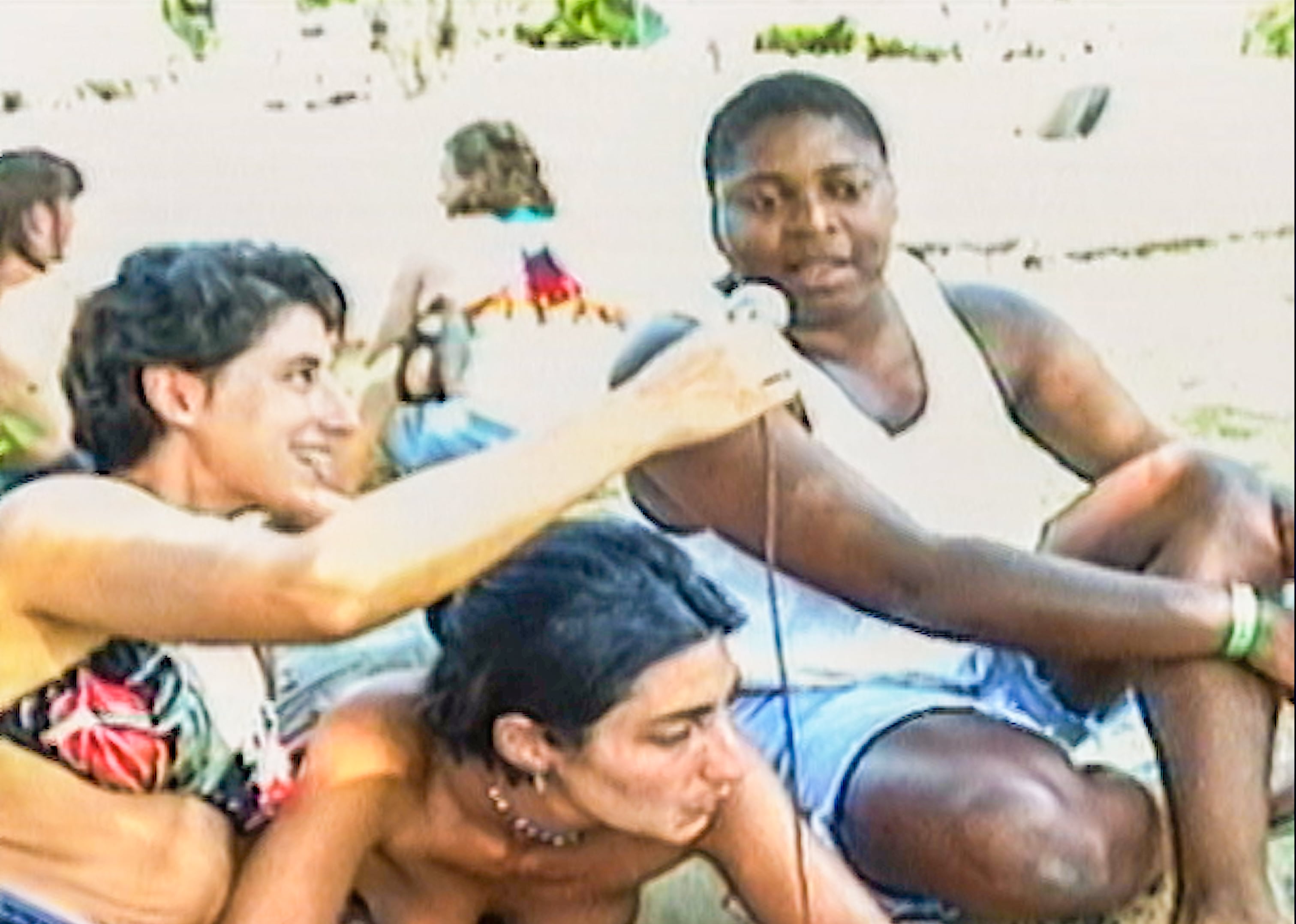 Franco Stevens, left, conducting an interview at the Michigan Womyn's Music Festival.